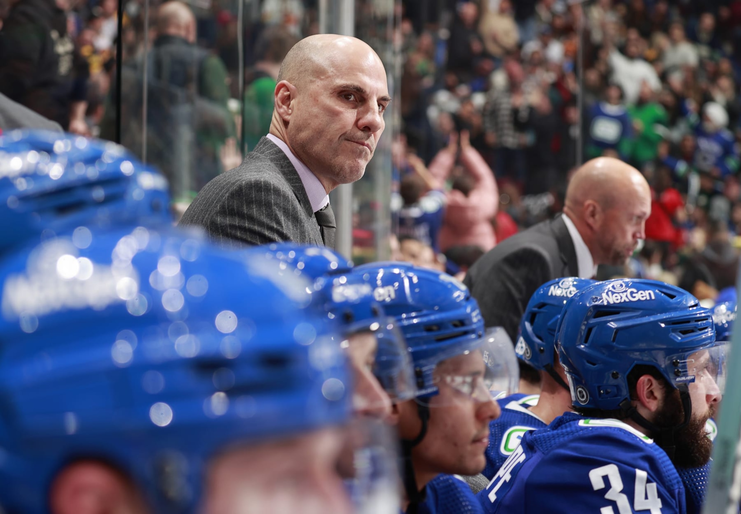 VANCOUVER, CANADA - NOVEMBER 4: Head coach Rick Tocchet of the Vancouver Canucks looks on from the bench during their NHL game against the Dallas Stars at Rogers Arena on November 4, 2023 in Vancouver, British Columbia, Canada.  (Photo by Jeff Vinnick/NHLI via Getty Images)