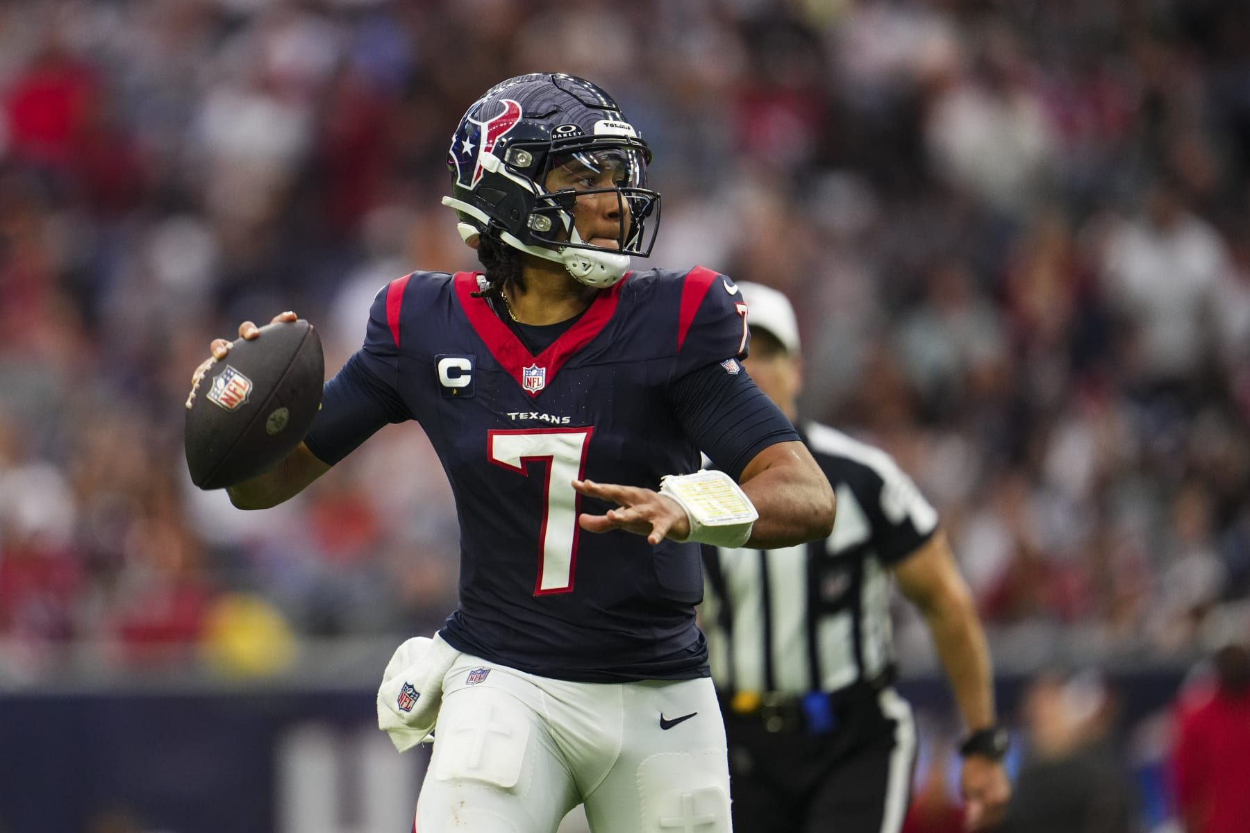 HOUSTON, TX - NOVEMBER 05: C.J. Stroud #7 of the Houston Texans throws the ball during an NFL football game against the Tampa Bay Buccaneers at NRG Stadium on November 5, 2023 in Houston, Texas. (Photo by Cooper Neill/Getty Images)
