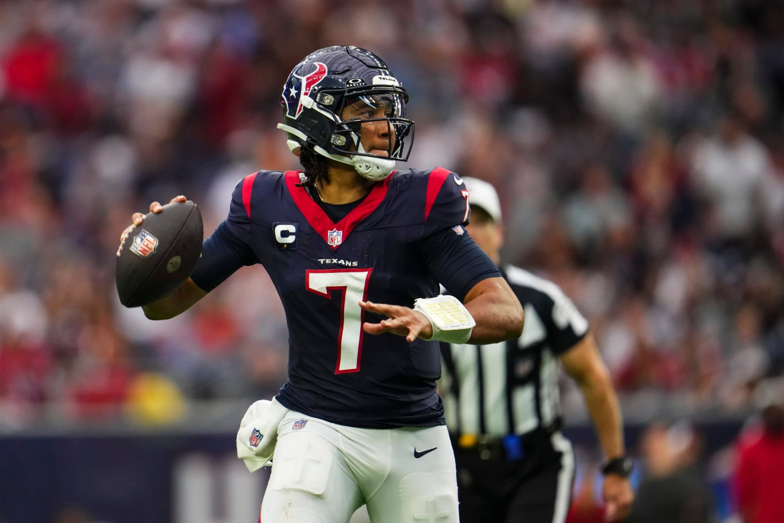HOUSTON, TX - NOVEMBER 05: C.J. Stroud #7 of the Houston Texans throws the ball during an NFL football game against the Tampa Bay Buccaneers at NRG Stadium on November 5, 2023 in Houston, Texas. (Photo by Cooper Neill/Getty Images)