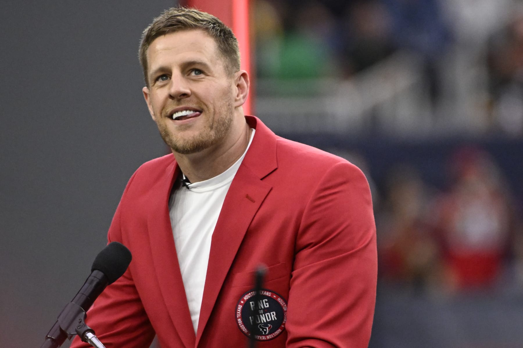 HOUSTON, TEXAS - OCTOBER 01: Former Houston Texans player J.J. Watt speaks during a ceremony inducting him into the Texans Ring of Honor during a game against the Pittsburgh Steelers at NRG Stadium on October 01, 2023 in Houston, Texas. (Photo by Logan Riely/Getty Images)