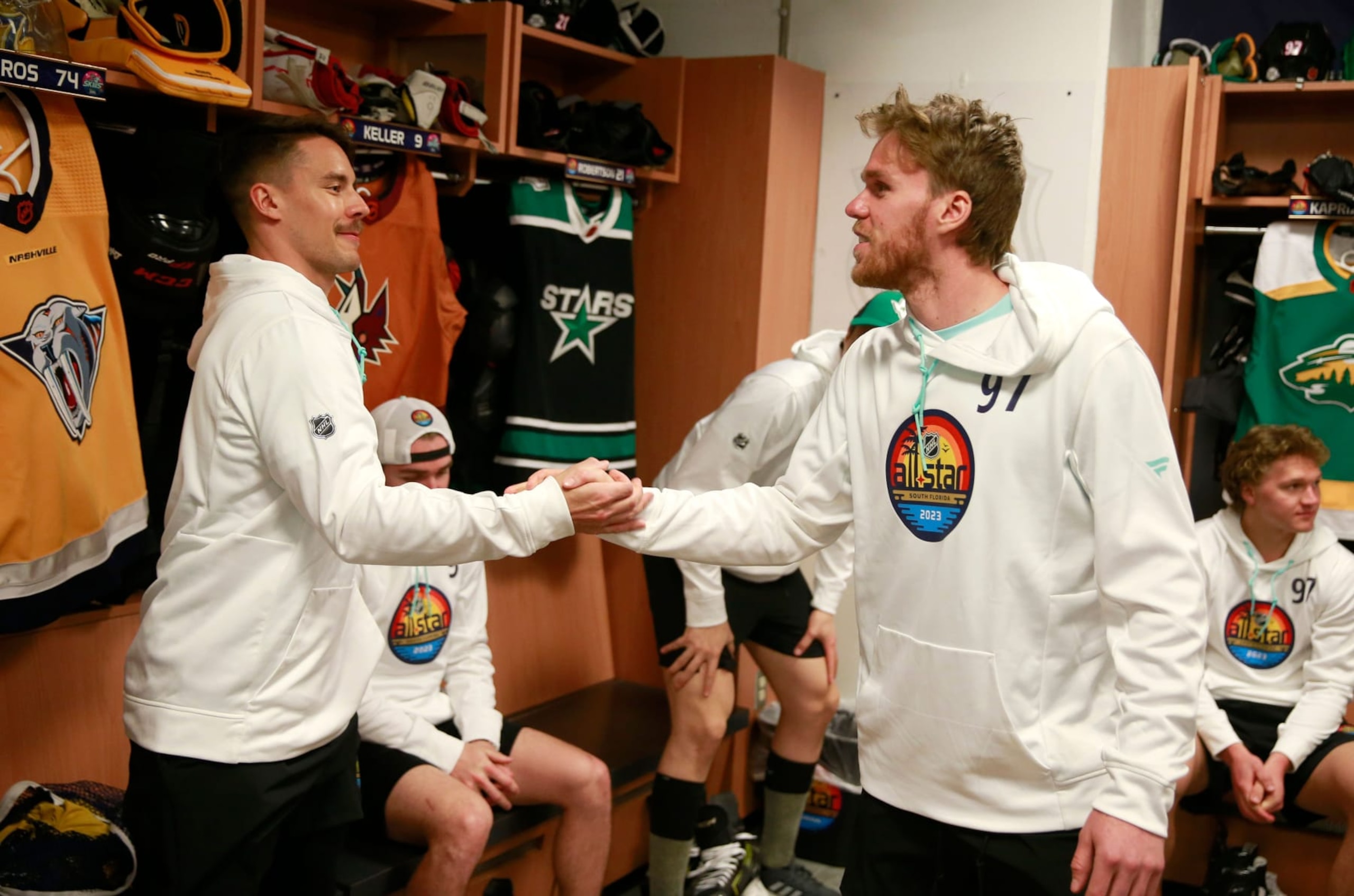 SUNRISE, FLORIDA - FEBRUARY 03: (L-R) Juuse Saros #74 of the Nashville Predators and Connor McDavid #97 of the Edmonton Oilers shake hands in the locker room before the skills competition at FLA Live Arena on February 03, 2023 in Sunrise, Florida. (Photo by Jeff Vinnick/NHLI via Getty Images) SUNRISE, FLORIDA - FEBRUARY 03: (L-R) Juuse Saros #74 of the Nashville Predators and Connor McDavid #97 of the Edmonton Oilers shake hands in the locker room before the skills competition at FLA Live Arena on February 03, 2023 in Sunrise, Florida. (Photo by Jeff Vinnick/NHLI via Getty Images)