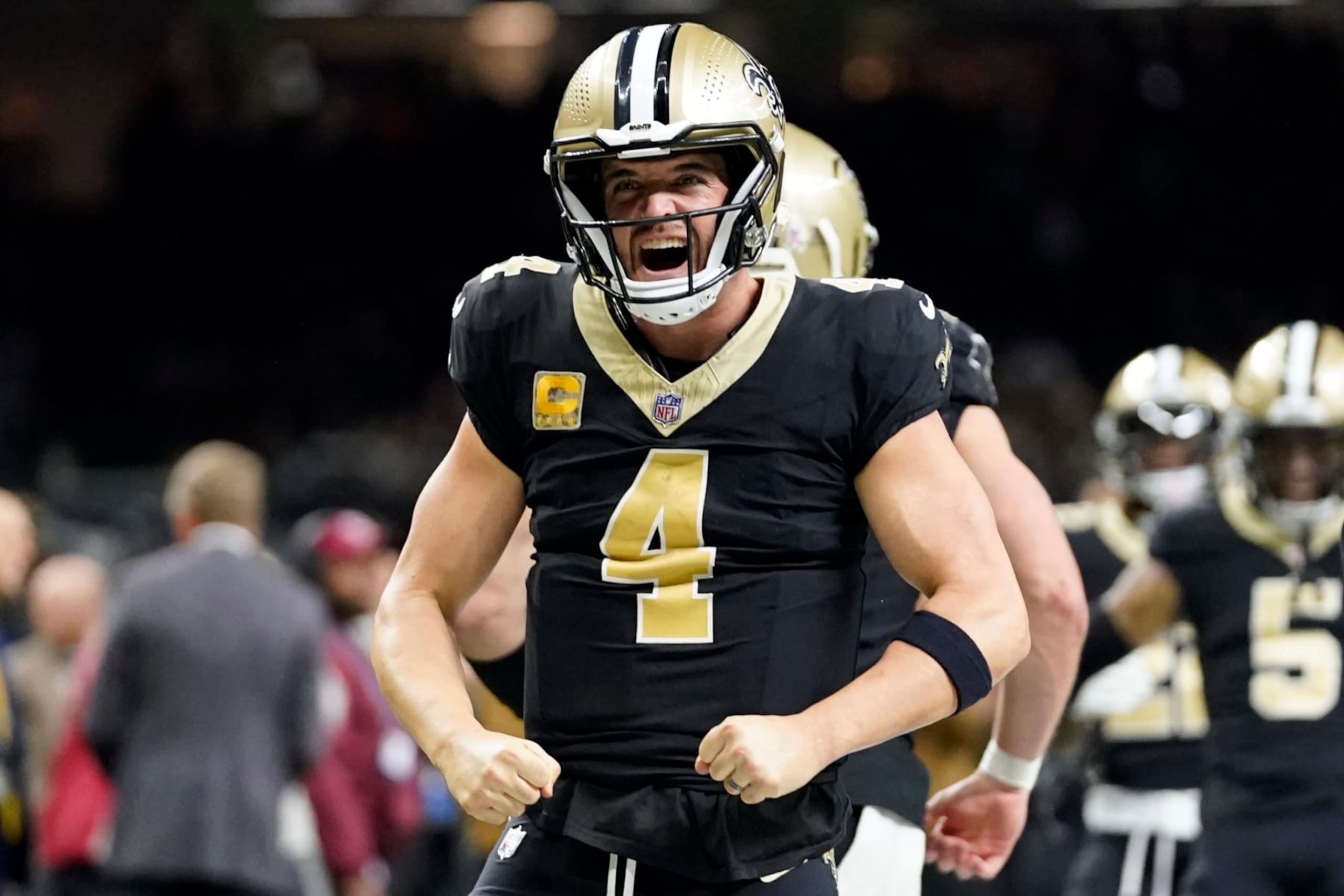 New Orleans Saints quarterback Derek Carr celebrates after throwing a touchdown pass to Taysom Hill during the first half of an NFL football game against the Chicago Bears in New Orleans, Sunday, Nov. 5, 2023. (AP Photo/Gerald Herbert) New Orleans Saints quarterback Derek Carr celebrates after throwing a touchdown pass to Taysom Hill during the first half of an NFL football game against the Chicago Bears in New Orleans, Sunday, Nov. 5, 2023. (AP Photo/Gerald Herbert)