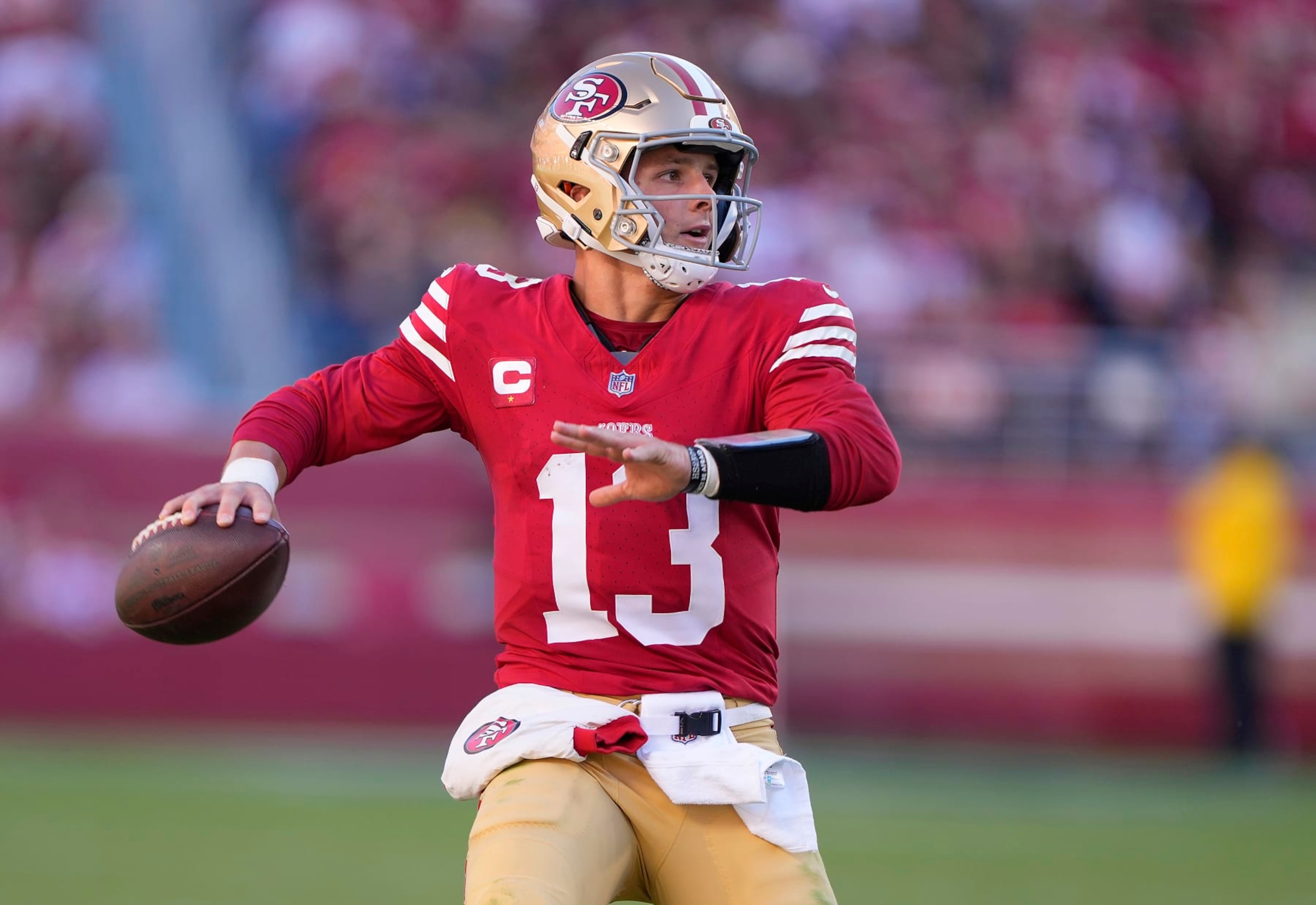 SANTA CLARA, CALIFORNIA - OCTOBER 29: Brock Purdy #13 of the San Francisco 49ers scrambles with the ball looking to pass against the Cincinnati Bengals during the fourth quarter of an NFL football game at Levi's Stadium on October 29, 2023 in Santa Clara, California. (Photo by Thearon W. Henderson/Getty Images) SANTA CLARA, CALIFORNIA - OCTOBER 29: Brock Purdy #13 of the San Francisco 49ers scrambles with the ball looking to pass against the Cincinnati Bengals during the fourth quarter of an NFL football game at Levi's Stadium on October 29, 2023 in Santa Clara, California. (Photo by Thearon W. Henderson/Getty Images)