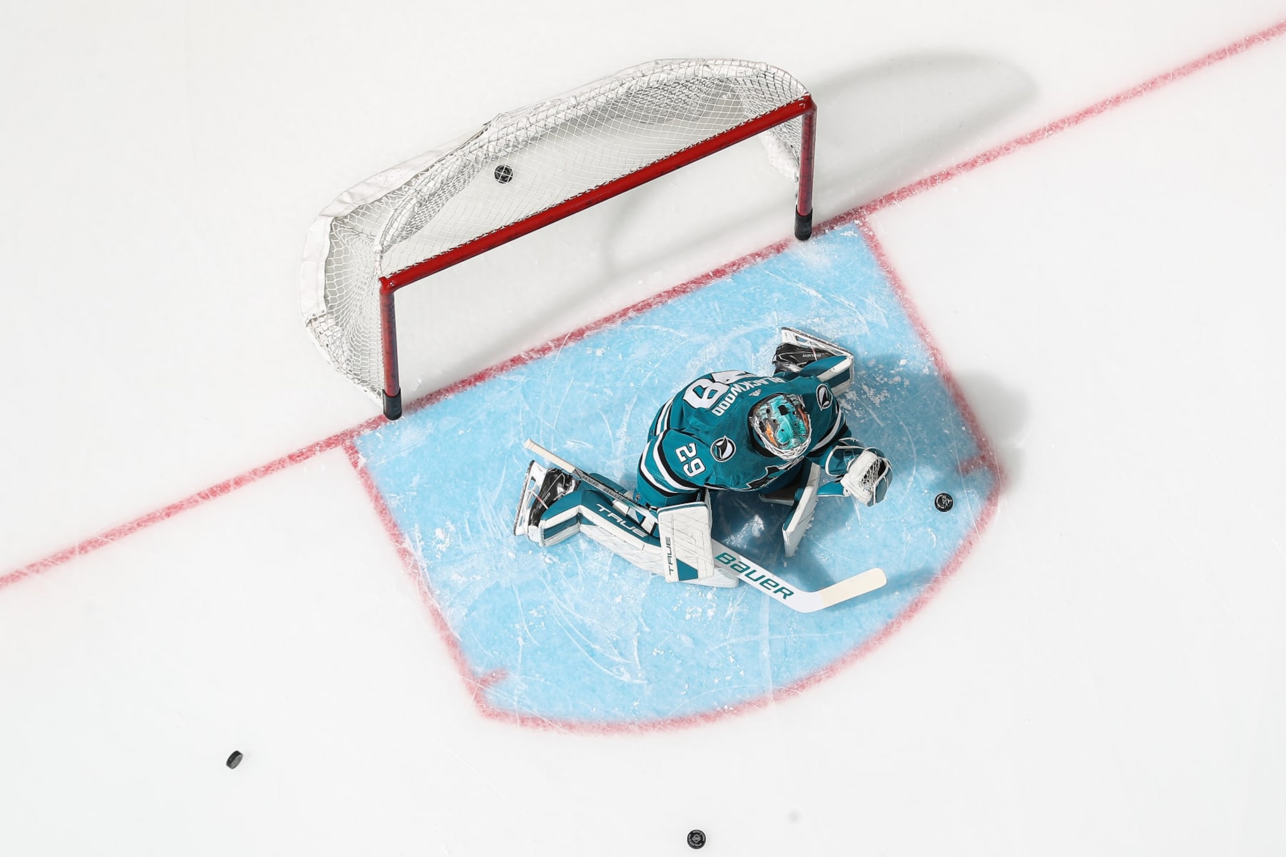 SAN JOSE, CA - NOVEMBER 7: An overhead view as MacKenzie Blackwood #29 of the San Jose Sharks skates during warmups before the game against the Philadelphia Flyers at SAP Center on November 7, 2023 in San Jose, California. (Photo by Kavin Mistry/NHLI via Getty Images)