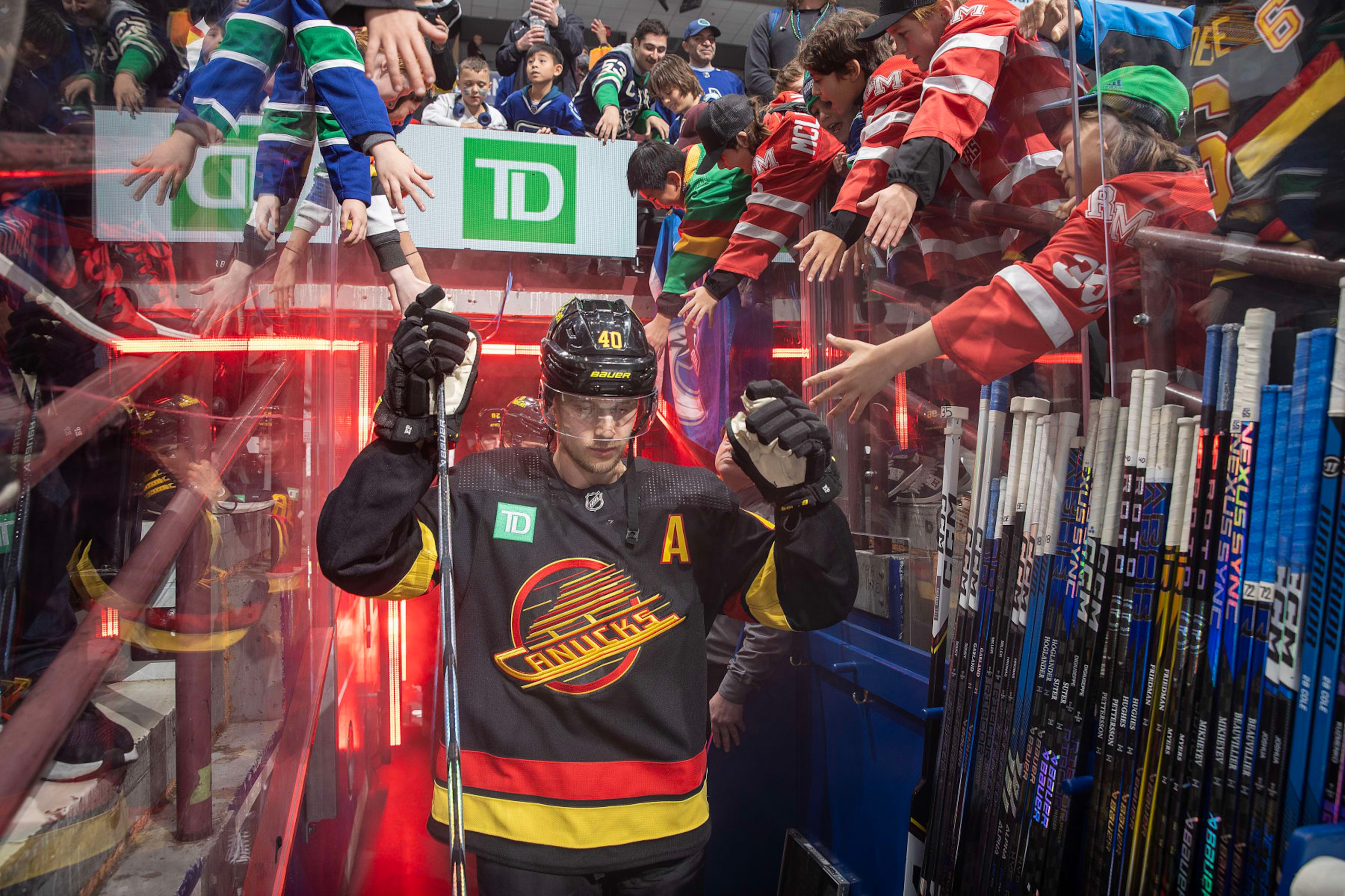 VANCOUVER, CANADA - NOVEMBER 6: Elias Pettersson #40 of the Vancouver Canucks enters the ice during warm up before their NHL game against the Edmonton Oilers at Rogers Arena on November 6, 2023 in Vancouver, British Columbia, Canada.  (Photo by Jeff Vinnick/NHLI via Getty Images)