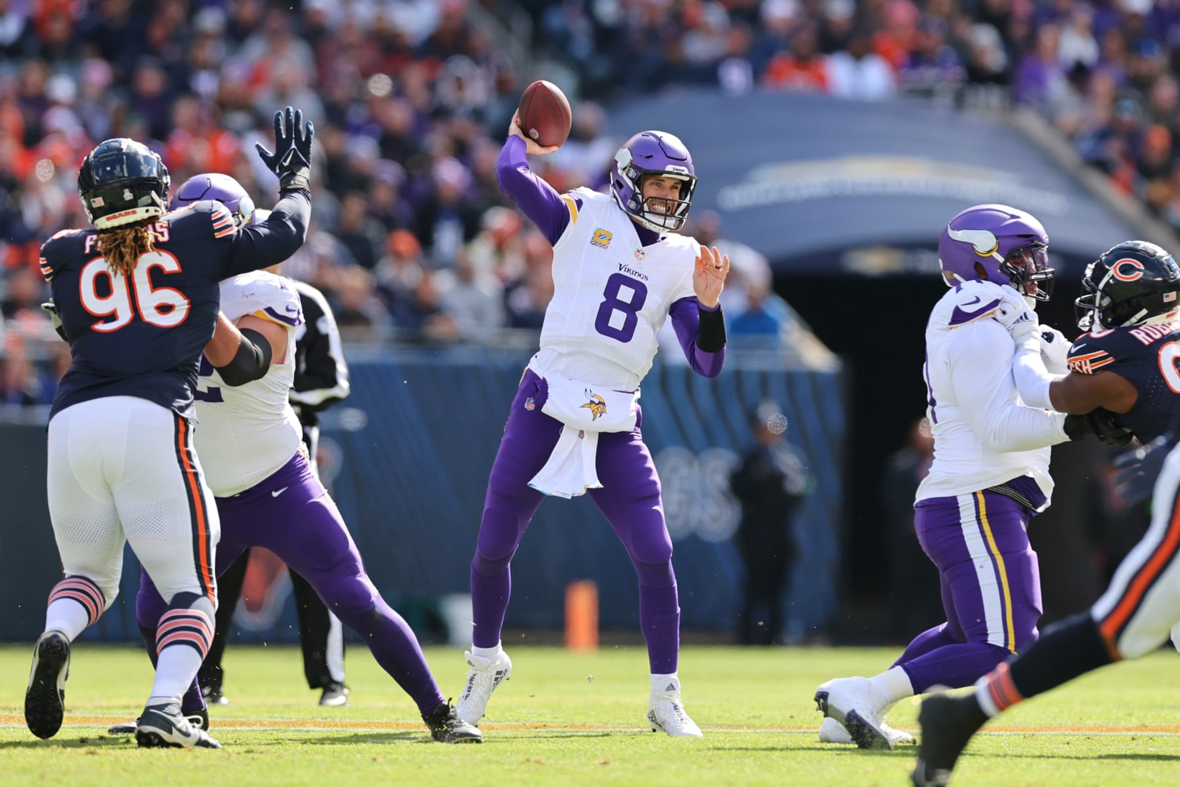 CHICAGO, ILLINOIS - OCTOBER 15: Kirk Cousins #8 of the Minnesota Vikings passes the ball in the game against the Chicago Bears during the first quarter at Soldier Field on October 15, 2023 in Chicago, Illinois. (Photo by Michael Reaves/Getty Images) CHICAGO, ILLINOIS - OCTOBER 15: Kirk Cousins #8 of the Minnesota Vikings passes the ball in the game against the Chicago Bears during the first quarter at Soldier Field on October 15, 2023 in Chicago, Illinois. (Photo by Michael Reaves/Getty Images)