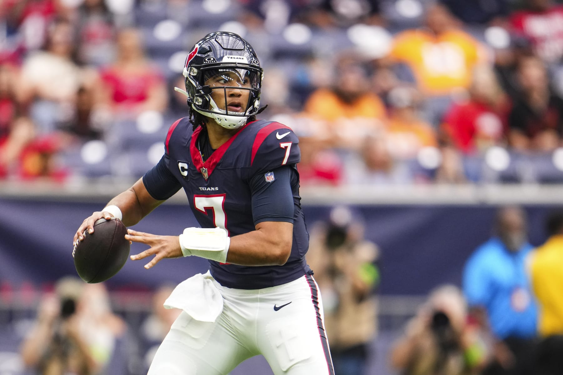 HOUSTON, TX - NOVEMBER 05: C.J. Stroud #7 of the Houston Texans drops back to pass during an NFL football game against the Tampa Bay Buccaneers at NRG Stadium on November 5, 2023 in Houston, Texas. (Photo by Cooper Neill/Getty Images)