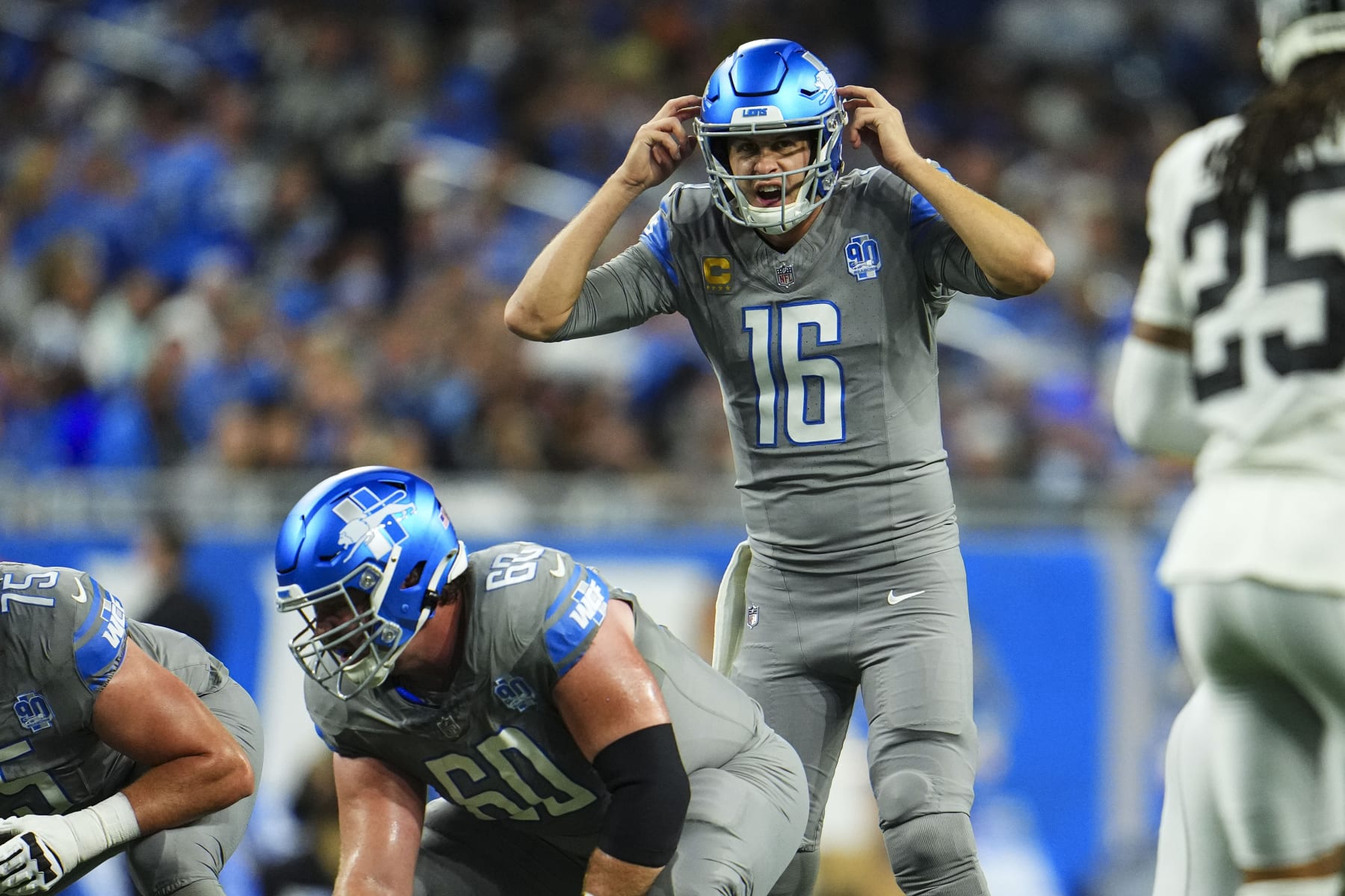 DETROIT, MI - OCTOBER 30: Jared Goff #16 of the Detroit Lions sets up during an NFL game against the Las Vegas Raiders at Ford Field on October 30, 2023 in Detroit, Michigan. (Photo by Cooper Neill/Getty Images)