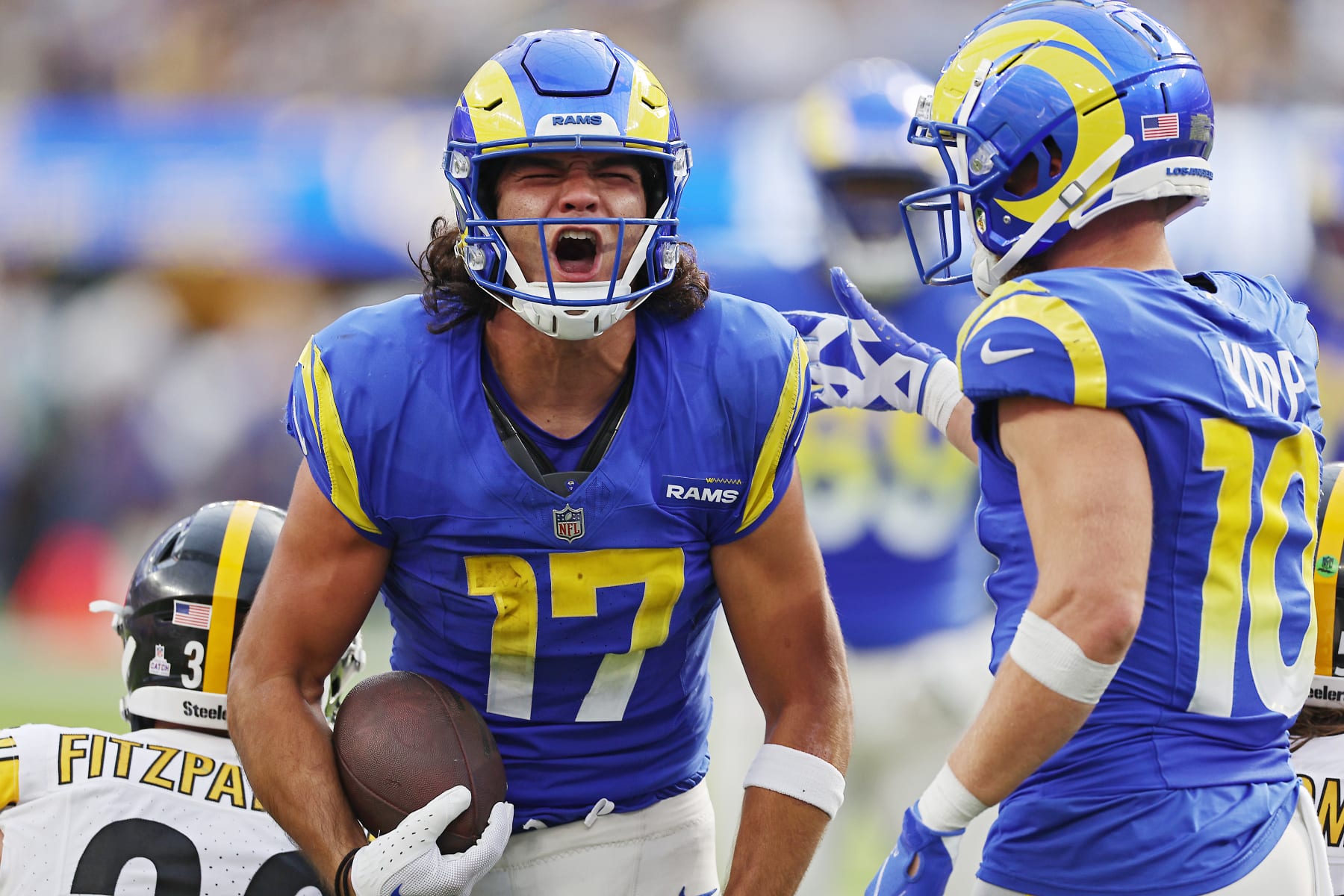 INGLEWOOD, CALIFORNIA - OCTOBER 22: Puka Nacua #17 of the Los Angeles Rams reacts to catching a pass during the third quarter against the Pittsburgh Steelers at SoFi Stadium on October 22, 2023 in Inglewood, California. (Photo by Harry How/Getty Images)