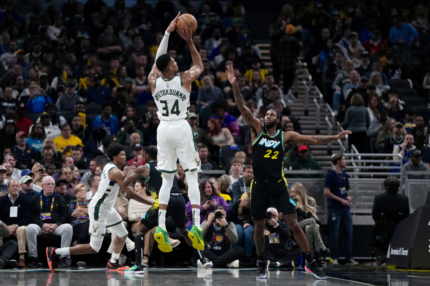 INDIANAPOLIS, INDIANA - NOVEMBER 09: Giannis Antetokounmpo #34 of the Milwaukee Bucks attempts a shot while being guarded by Isaiah Jackson #22 of the Indiana Pacers in the first quarter at Gainbridge Fieldhouse on November 09, 2023 in Indianapolis, Indiana. NOTE TO USER: User expressly acknowledges and agrees that, by downloading and or using this photograph, User is consenting to the terms and conditions of the Getty Images License Agreement. (Photo by Dylan Buell/Getty Images)