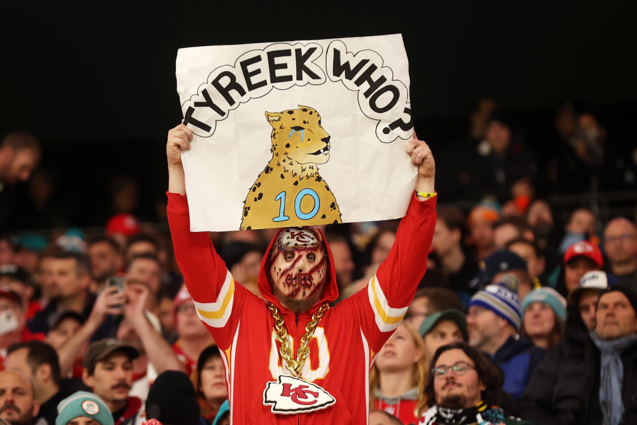 FRANKFURT AM MAIN, GERMANY - NOVEMBER 05: A fan of Kansas City Chiefs holds a banner reading 'Tyreek Who?', directed at former Kansas City Chiefs player Tyreek Hill #10 of the Miami Dolphins in the third quarter during the NFL match between Miami Dolphins and Kansas City Chiefs at Deutsche Bank Park on November 05, 2023 in Frankfurt am Main, Germany. (Photo by Alex Grimm/Getty Images)