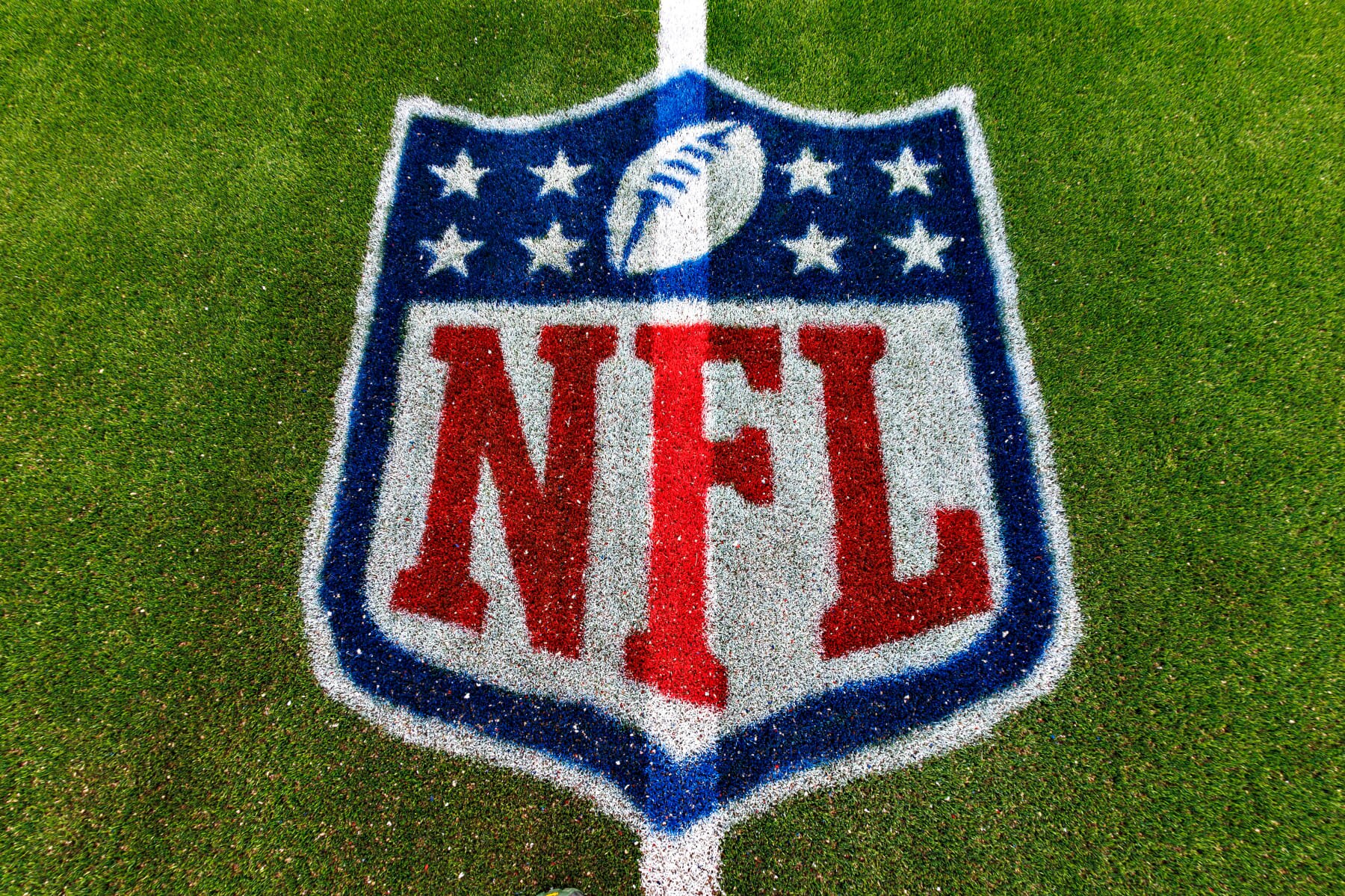 NASHVILLE, TENNESSEE - OCTOBER 29: NFL logo on the field before the game between the Tennessee Titans and the Atlanta Falcons at Nissan Stadium on October 29, 2023 in Nashville, Tennessee. The Titans defeated the Falcons 28-23. (Photo by Wesley Hitt/Getty Images)