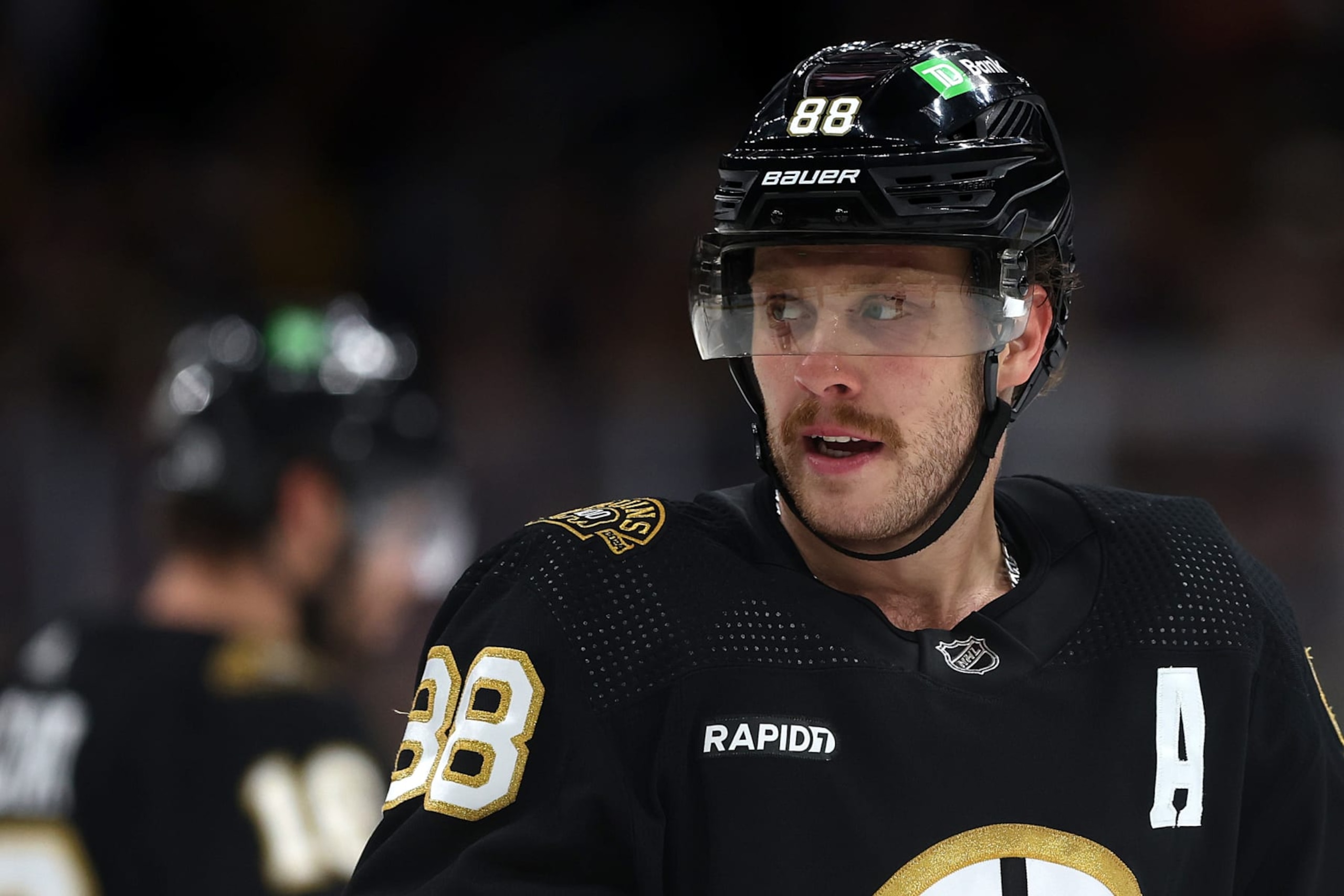 BOSTON, MASSACHUSETTS - NOVEMBER 09: David Pastrnak #88 of the Boston Bruins looks on during the third period against the New York Islanders at TD Garden on November 09, 2023 in Boston, Massachusetts. The Bruins defeat the Islanders 5-2. (Photo by Maddie Meyer/Getty Images) BOSTON, MASSACHUSETTS - NOVEMBER 09: David Pastrnak #88 of the Boston Bruins looks on during the third period against the New York Islanders at TD Garden on November 09, 2023 in Boston, Massachusetts. The Bruins defeat the Islanders 5-2. (Photo by Maddie Meyer/Getty Images)