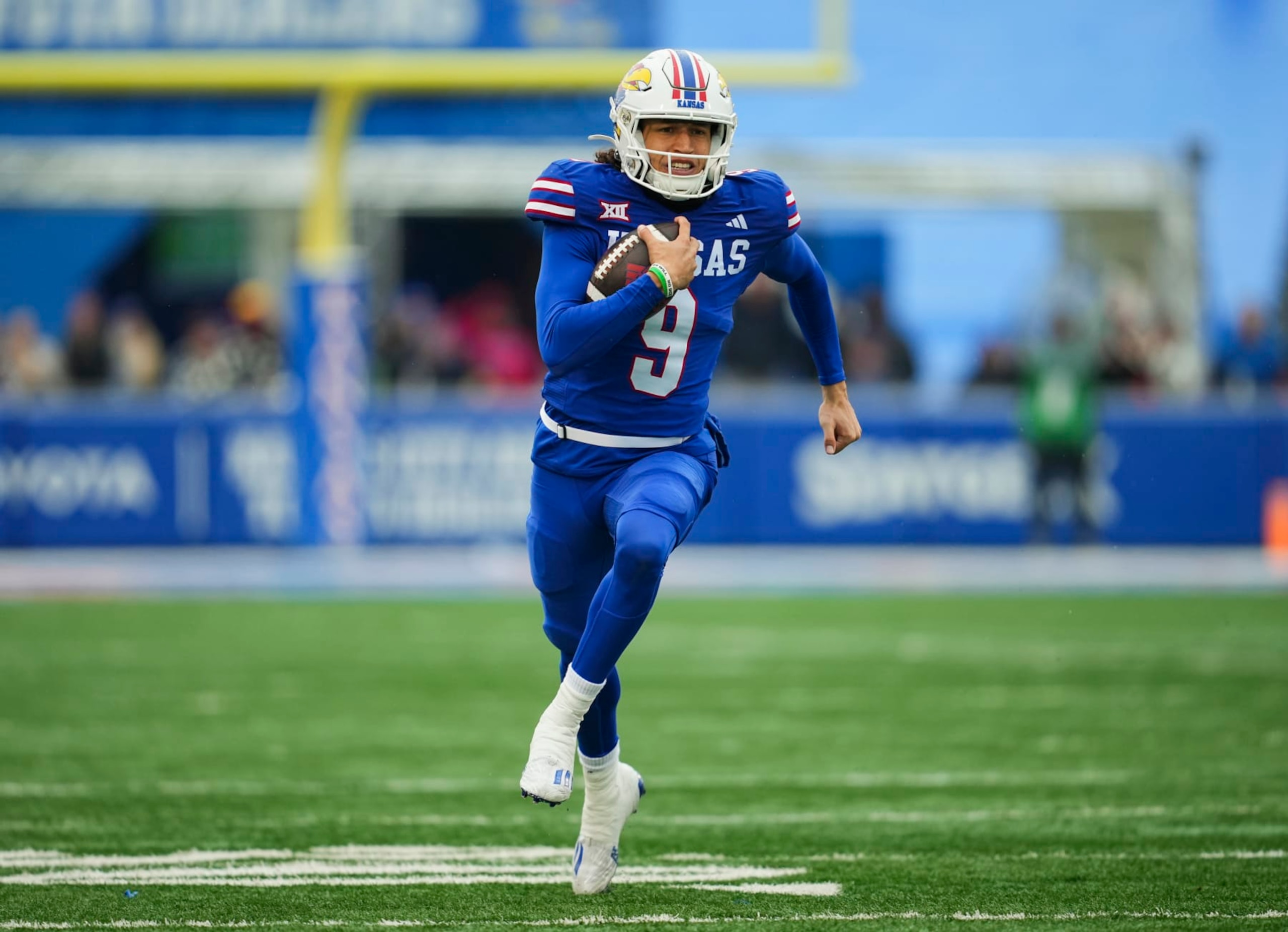 LAWRENCE, KANSAS - OCTOBER 28: Quarterback Jason Bean #9 of the Kansas Jayhawks runs for a touchdown during the second half against the Oklahoma Sooners at David Booth Kansas Memorial Stadium on October 28, 2023 in Lawrence, Kansas. (Photo by Jay Biggerstaff/Getty Images) LAWRENCE, KANSAS - OCTOBER 28: Quarterback Jason Bean #9 of the Kansas Jayhawks runs for a touchdown during the second half against the Oklahoma Sooners at David Booth Kansas Memorial Stadium on October 28, 2023 in Lawrence, Kansas. (Photo by Jay Biggerstaff/Getty Images)