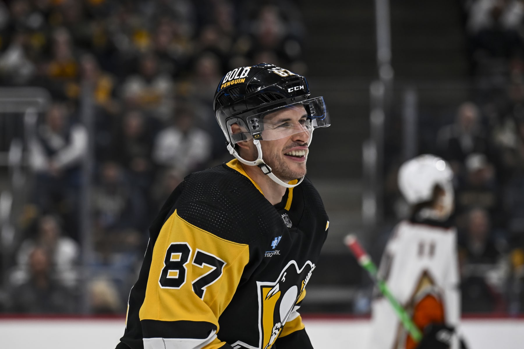 PITTSBURGH, PA - OCTOBER 30: Pittsburgh Penguins center Sidney Crosby (87) smiles during the second period in the NHL game between the Pittsburgh Penguins and the Anaheim Ducks on October 30, 2023, at PPG Paints Arena in Pittsburgh, PA. (Photo by Jeanine Leech/Icon Sportswire via Getty Images)