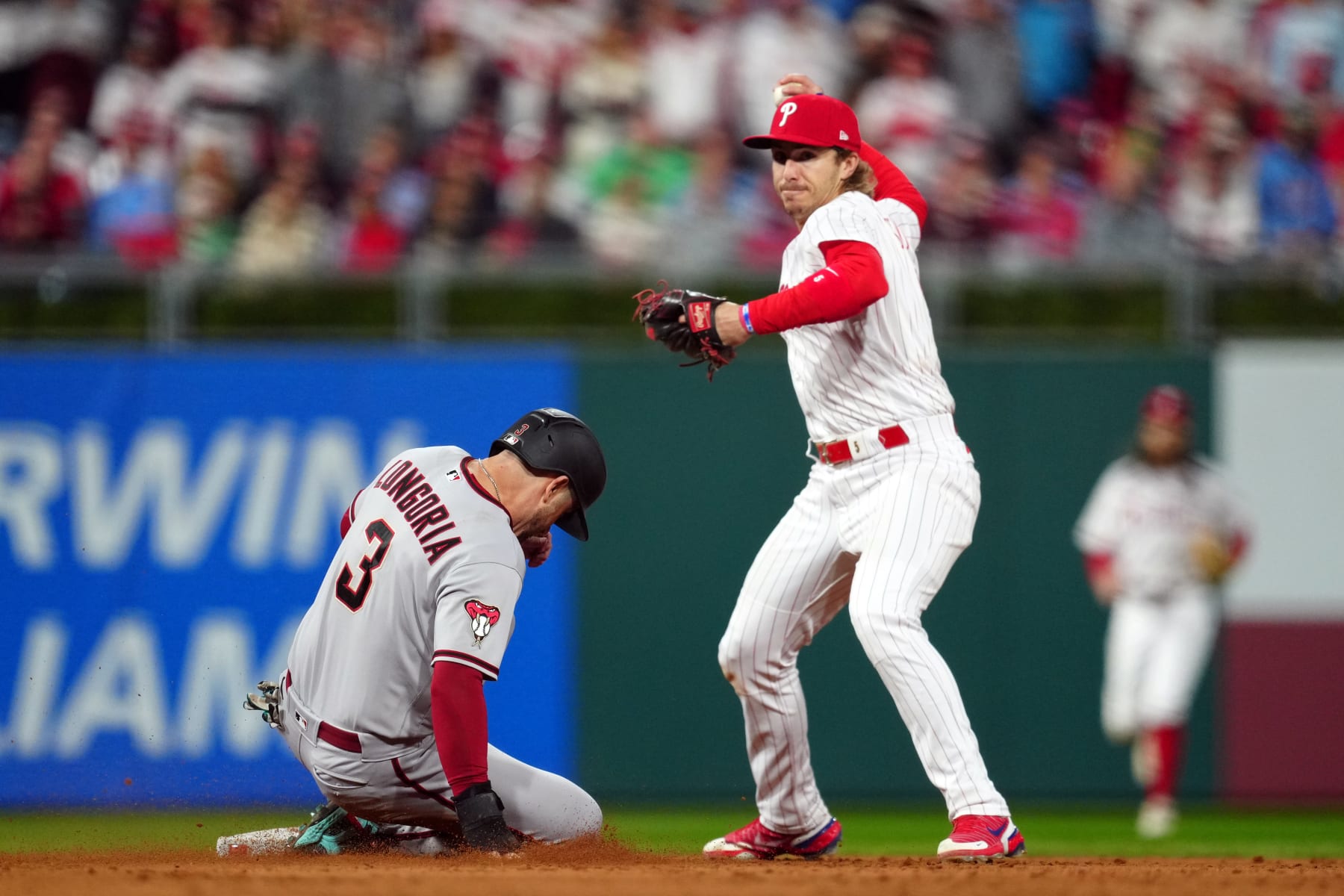 PHILADELPHIA, PA - OCTOBER 17:  Bryson Stott #5 of the Philadelphia Phillies attempts to turn a double play during Game 2 of the NLCS between the Arizona Diamondbacks and the Philadelphia Phillies at Citizens Bank Park on Tuesday, October 17, 2023 in Philadelphia, Pennsylvania. (Photo by Mary DeCicco/MLB Photos via Getty Images)
