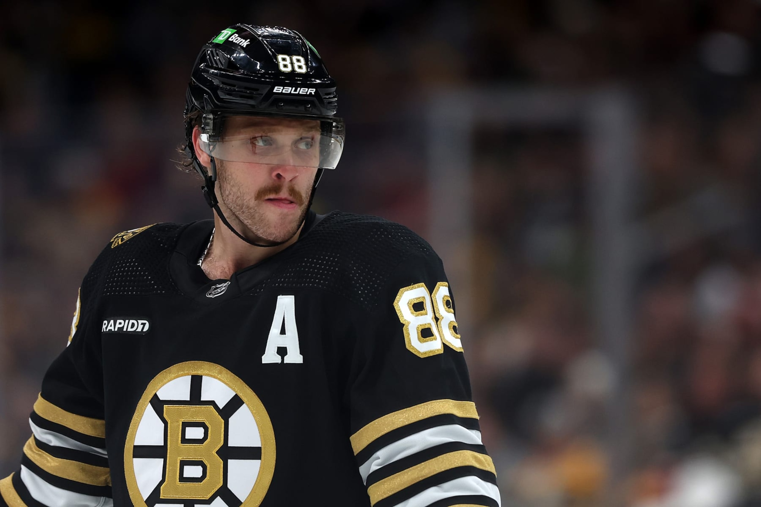 BOSTON, MASSACHUSETTS - NOVEMBER 09: David Pastrnak #88 of the Boston Bruins looks on during the third period against the New York Islanders at TD Garden on November 09, 2023 in Boston, Massachusetts. The Bruins defeat the Islanders 5-2.  (Photo by Maddie Meyer/Getty Images)
