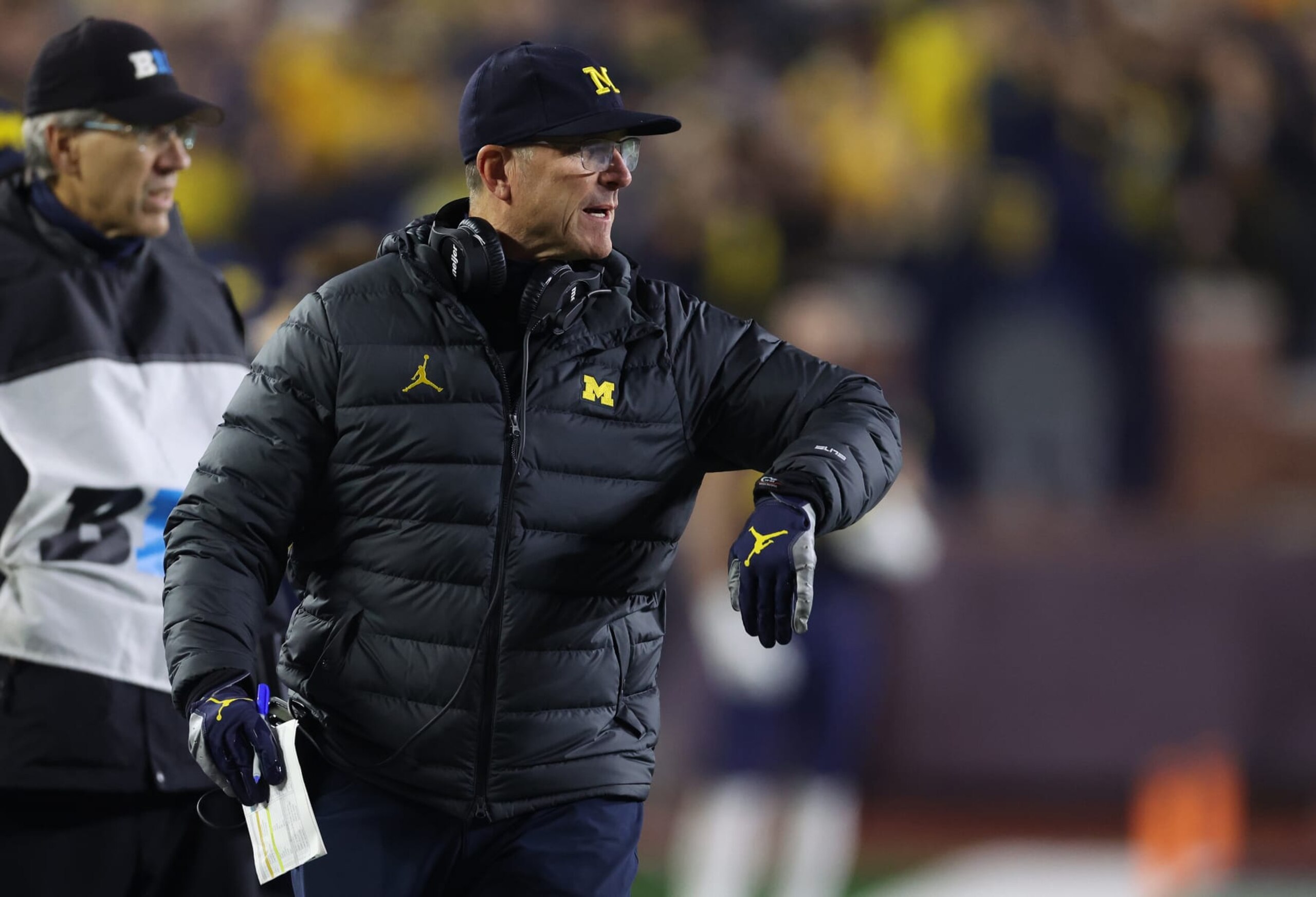 ANN ARBOR, MICHIGAN - NOVEMBER 04: Head coach Jim Harbaugh of the Michigan Wolverines looks on in the first half while playing the Purdue Boilermakers at Michigan Stadium on November 04, 2023 in Ann Arbor, Michigan. (Photo by Gregory Shamus/Getty Images)