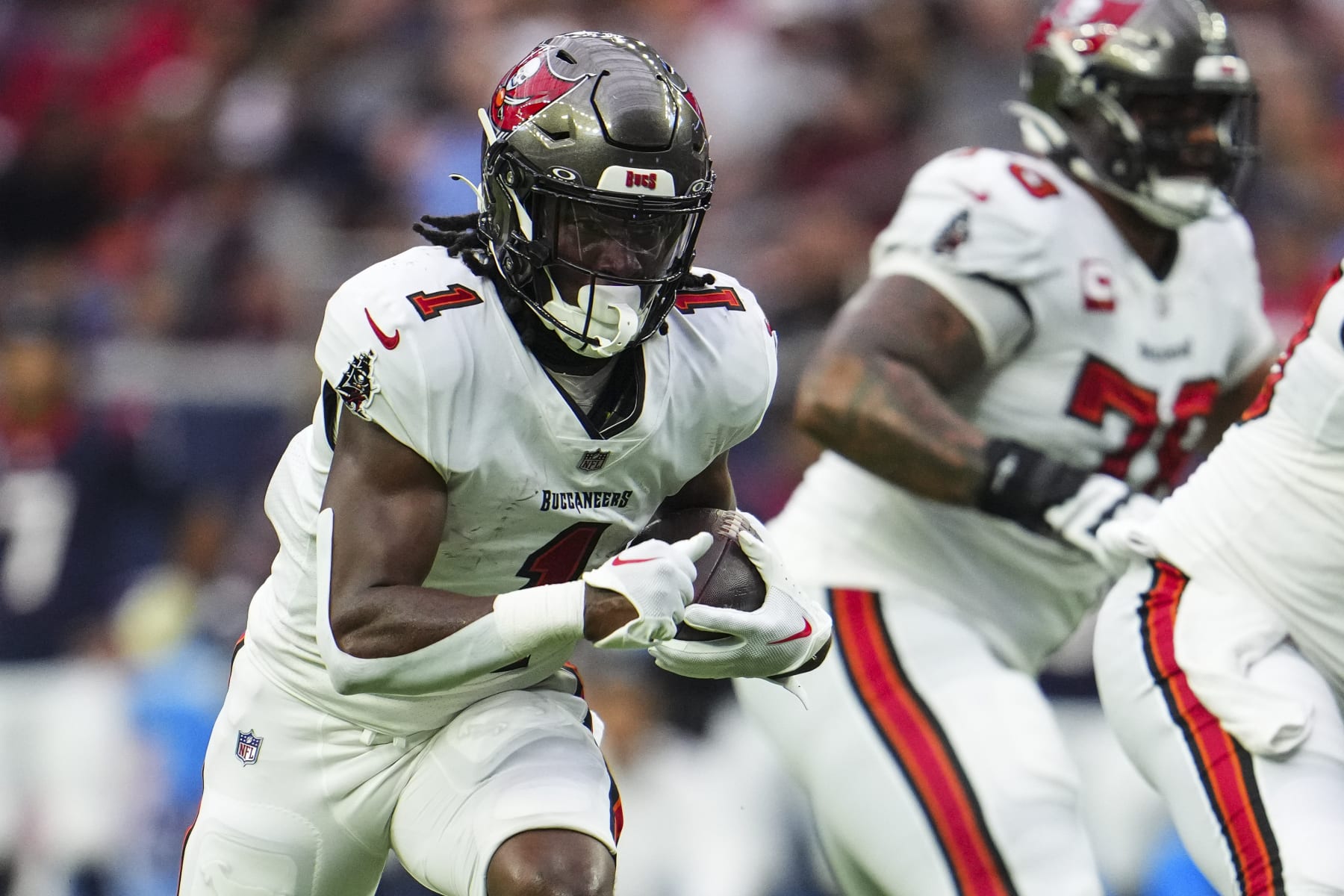HOUSTON, TX - NOVEMBER 05: Rachaad White #1 of the Tampa Bay Buccaneers runs the ball during an NFL football game against the Houston Texans at NRG Stadium on November 5, 2023 in Houston, Texas. (Photo by Cooper Neill/Getty Images)