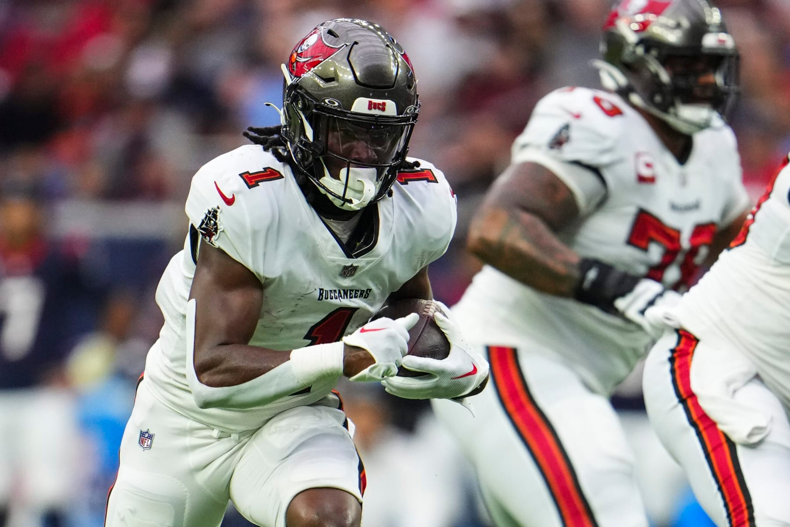 HOUSTON, TX - NOVEMBER 05: Rachaad White #1 of the Tampa Bay Buccaneers runs the ball during an NFL football game against the Houston Texans at NRG Stadium on November 5, 2023 in Houston, Texas. (Photo by Cooper Neill/Getty Images)