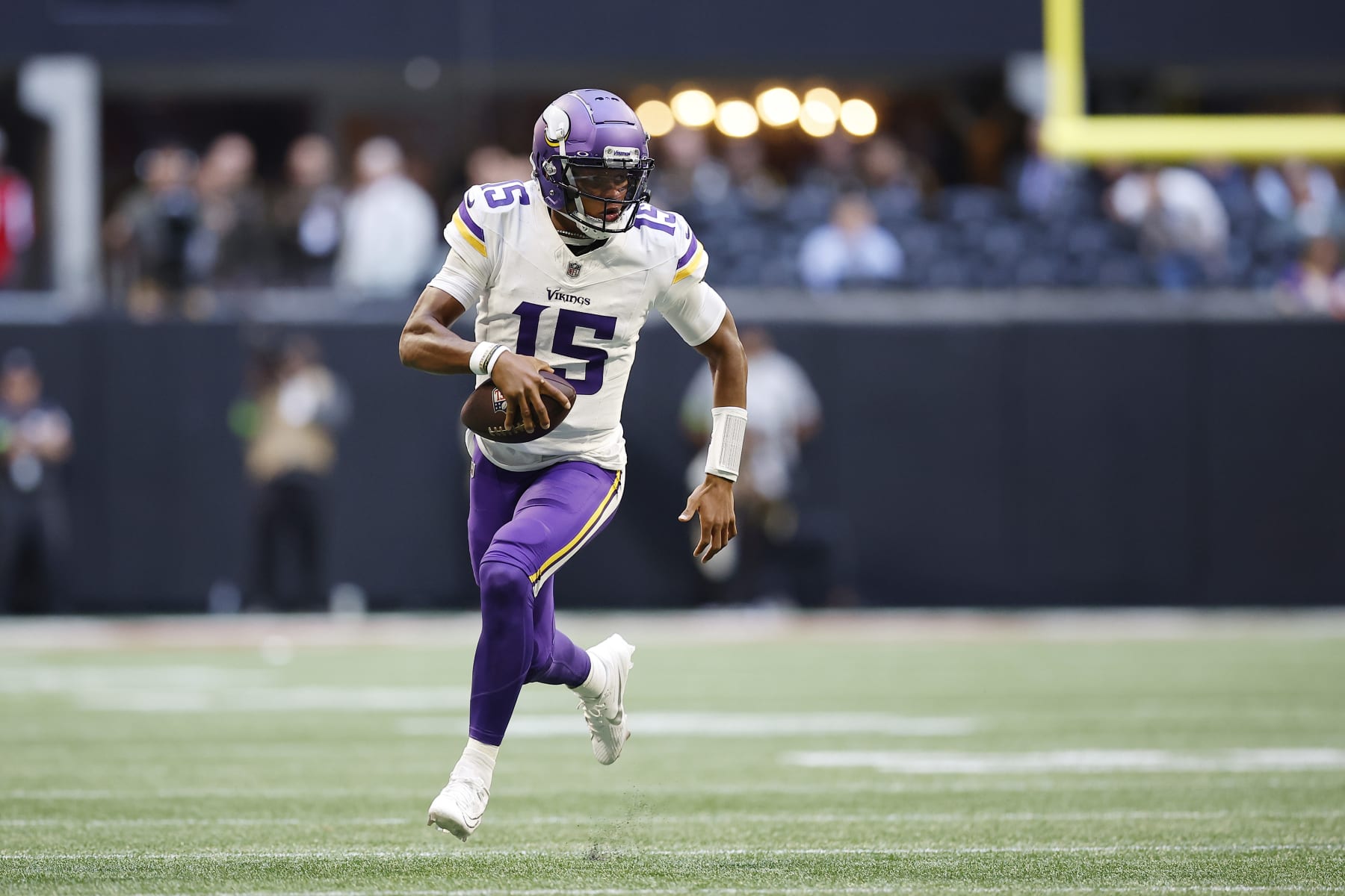 ATLANTA, GEORGIA - NOVEMBER 05: Joshua Dobbs #15 of the Minnesota Vikings runs the ball during the third quarter against the Atlanta Falcons at Mercedes-Benz Stadium on November 05, 2023 in Atlanta, Georgia. (Photo by Alex Slitz/Getty Images)