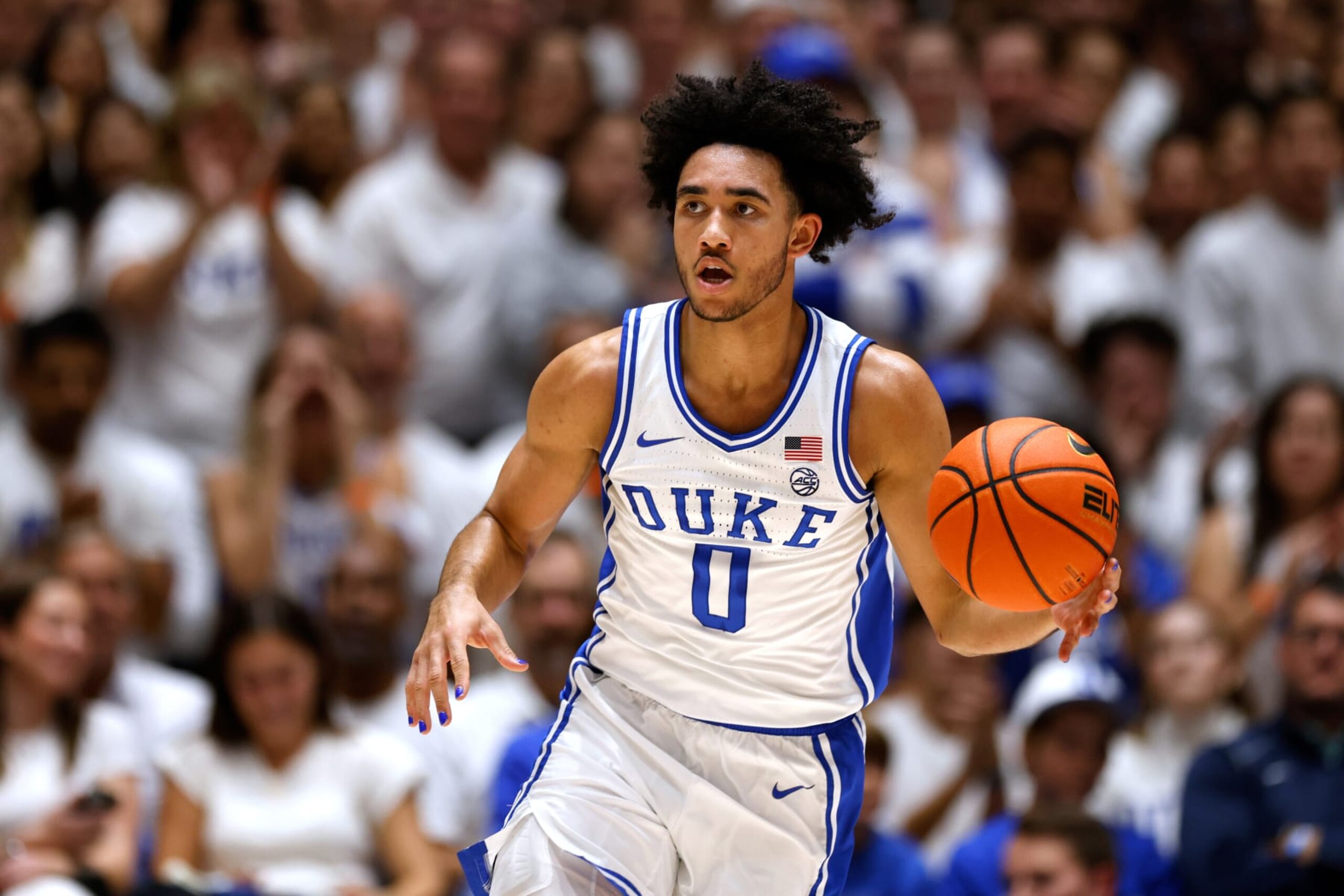 DURHAM, NORTH CAROLINA - NOVEMBER 10: Jared McCain #0 of the Duke Blue Devils dribbles up court against the Arizona Wildcats during the first half of the game at Cameron Indoor Stadium on November 10, 2023 in Durham, North Carolina. (Photo by Lance King/Getty Images)