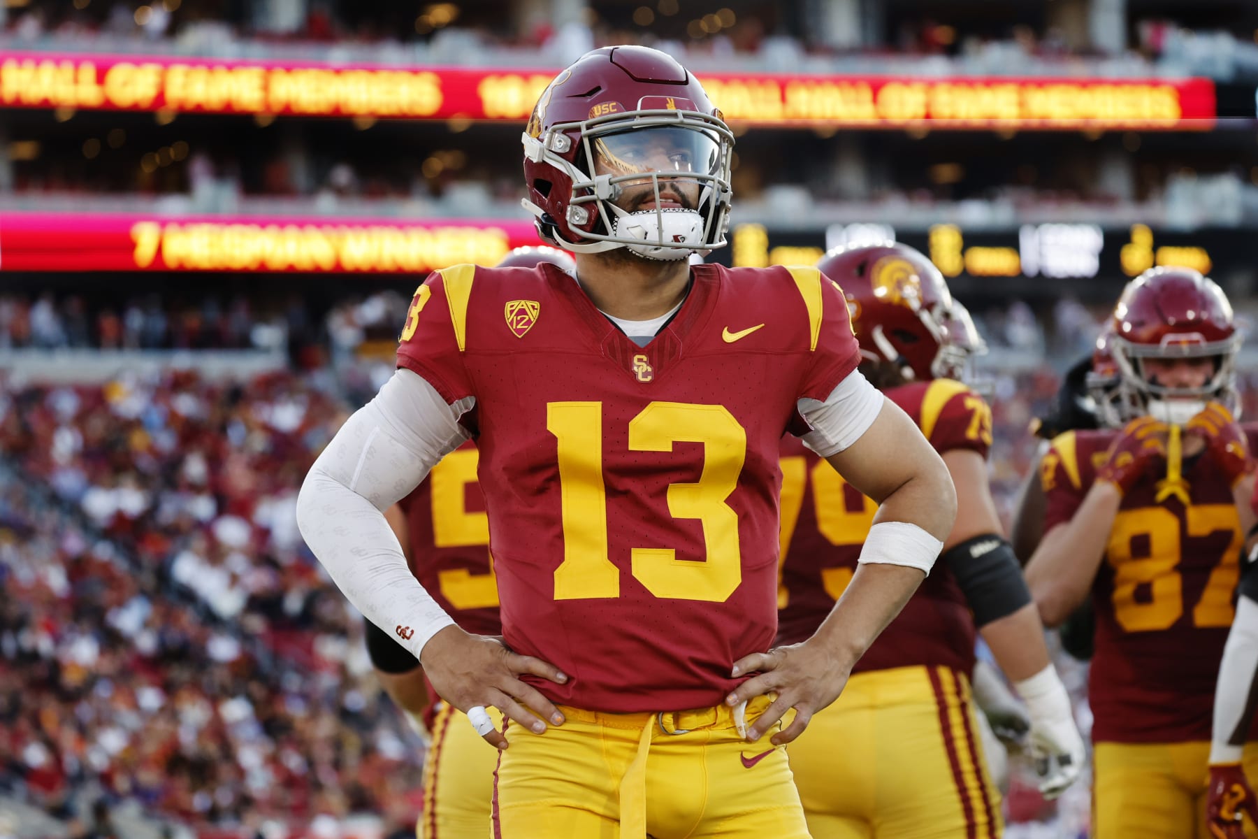 LOS ANGELES, CA  - NOVEMBER 4, 2023: USC Trojans quarterback Caleb Williams (13) stands alone during a timeout against Washington at the   L.A. Memorial Coliseum November 4, 2023 in Los Angeles, California. (Gina Ferazzi / Los Angeles Times via Getty Images)