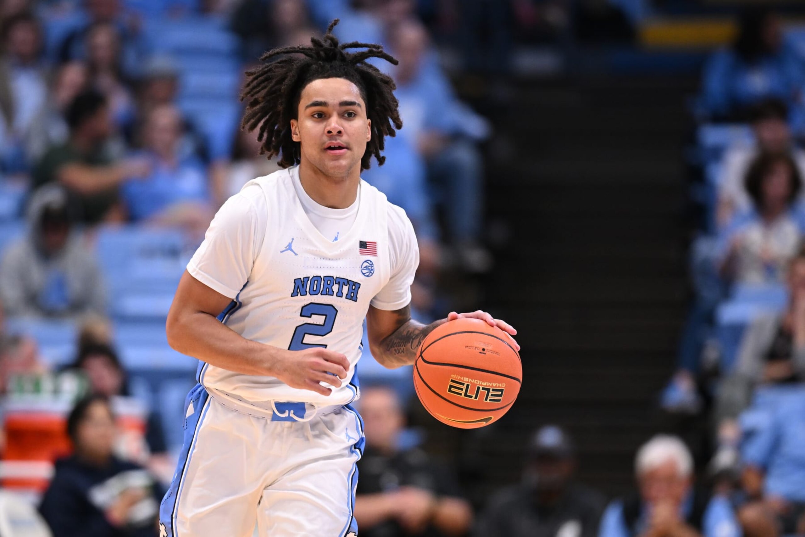 CHAPEL HILL, NORTH CAROLINA - OCTOBER 27: Elliot Cadeau #2 of the North Carolina Tar Heels moves the ball against the Saint Augustine Falcons during their game at the Dean E. Smith Center on October 27, 2023 in Chapel Hill, North Carolina. The Tar Heels won 117-53. (Photo by Grant Halverson/Getty Images)