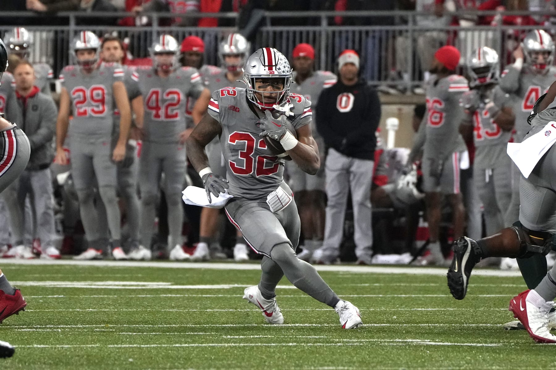 COLUMBUS, OH - NOVEMBER 11: TreVeyon Henderson #32 of the Ohio State Buckeyes runs with the ball during the game against the Michigan State Spartans at Ohio Stadium in Columbus, Ohio on November 11, 2023. (Photo by Jason Mowry/Icon Sportswire via Getty Images)