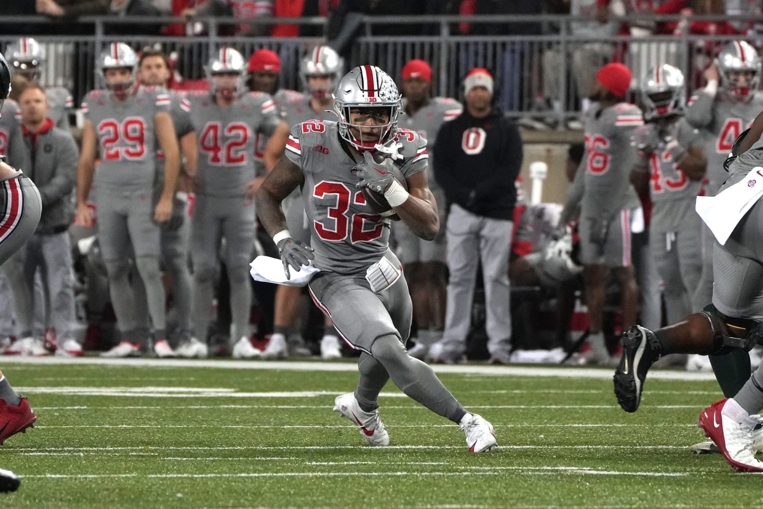 COLUMBUS, OH - NOVEMBER 11: TreVeyon Henderson #32 of the Ohio State Buckeyes runs with the ball during the game against the Michigan State Spartans at Ohio Stadium in Columbus, Ohio on November 11, 2023. (Photo by Jason Mowry/Icon Sportswire via Getty Images)