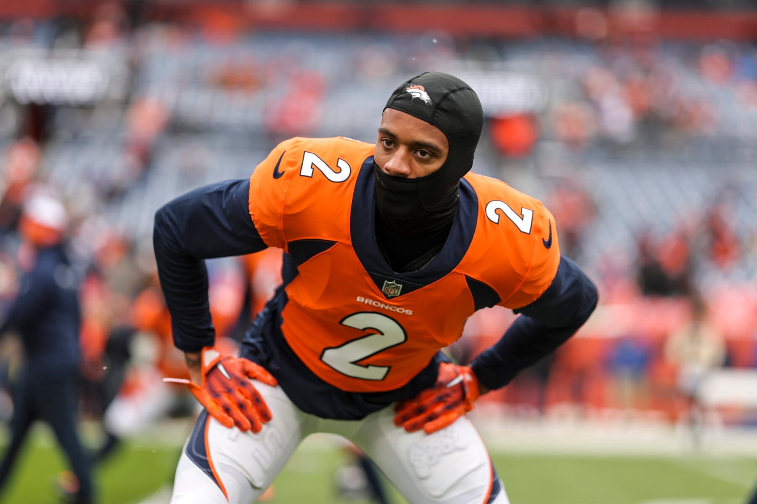 DENVER, COLORADO - OCTOBER 29: Pat Surtain II #2 of the Denver Broncos stretches as he warms up prior to an NFL football game between the Denver Broncos and the Kansas City Chiefs at Empower Field At Mile High on October 29, 2023 in Denver, Colorado. (Photo by Michael Owens/Getty Images)