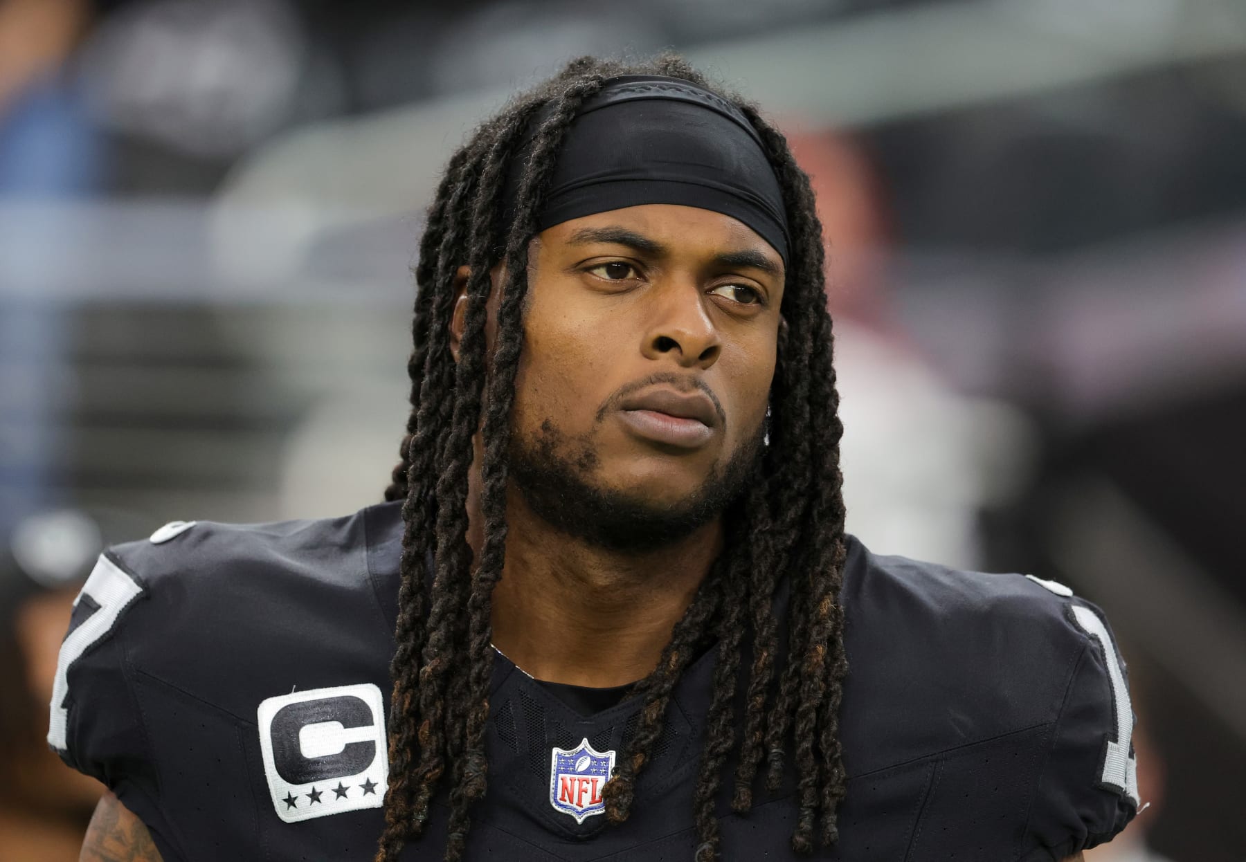 LAS VEGAS, NEVADA - NOVEMBER 05: Wide receiver Davante Adams #17 of the Las Vegas Raiders looks on as the United Staes national anthem is performed before a game against the New York Giants at Allegiant Stadium on November 05, 2023 in Las Vegas, Nevada. The Raiders defeated the Giants 30-6. (Photo by Ethan Miller/Getty Images)