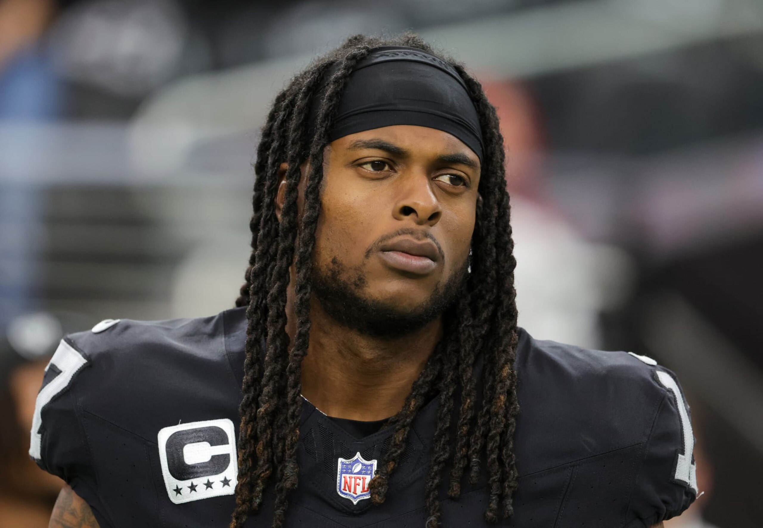 LAS VEGAS, NEVADA - NOVEMBER 05: Wide receiver Davante Adams #17 of the Las Vegas Raiders looks on as the United Staes national anthem is performed before a game against the New York Giants at Allegiant Stadium on November 05, 2023 in Las Vegas, Nevada. The Raiders defeated the Giants 30-6. (Photo by Ethan Miller/Getty Images)