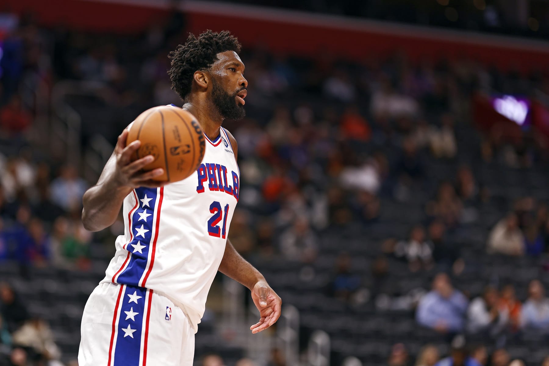 DETROIT, MICHIGAN - NOVEMBER 10: Joel Embiid #21 of the Philadelphia 76ers looks to pass the ball in the fourth quarter of a game against the Detroit Pistons at Little Caesars Arena on November 10, 2023 in Detroit, Michigan. NOTE TO USER: User expressly acknowledges and agrees that, by downloading and or using this photograph, User is consenting to the terms and conditions of the Getty Images License Agreement. (Photo by Mike Mulholland/Getty Images)