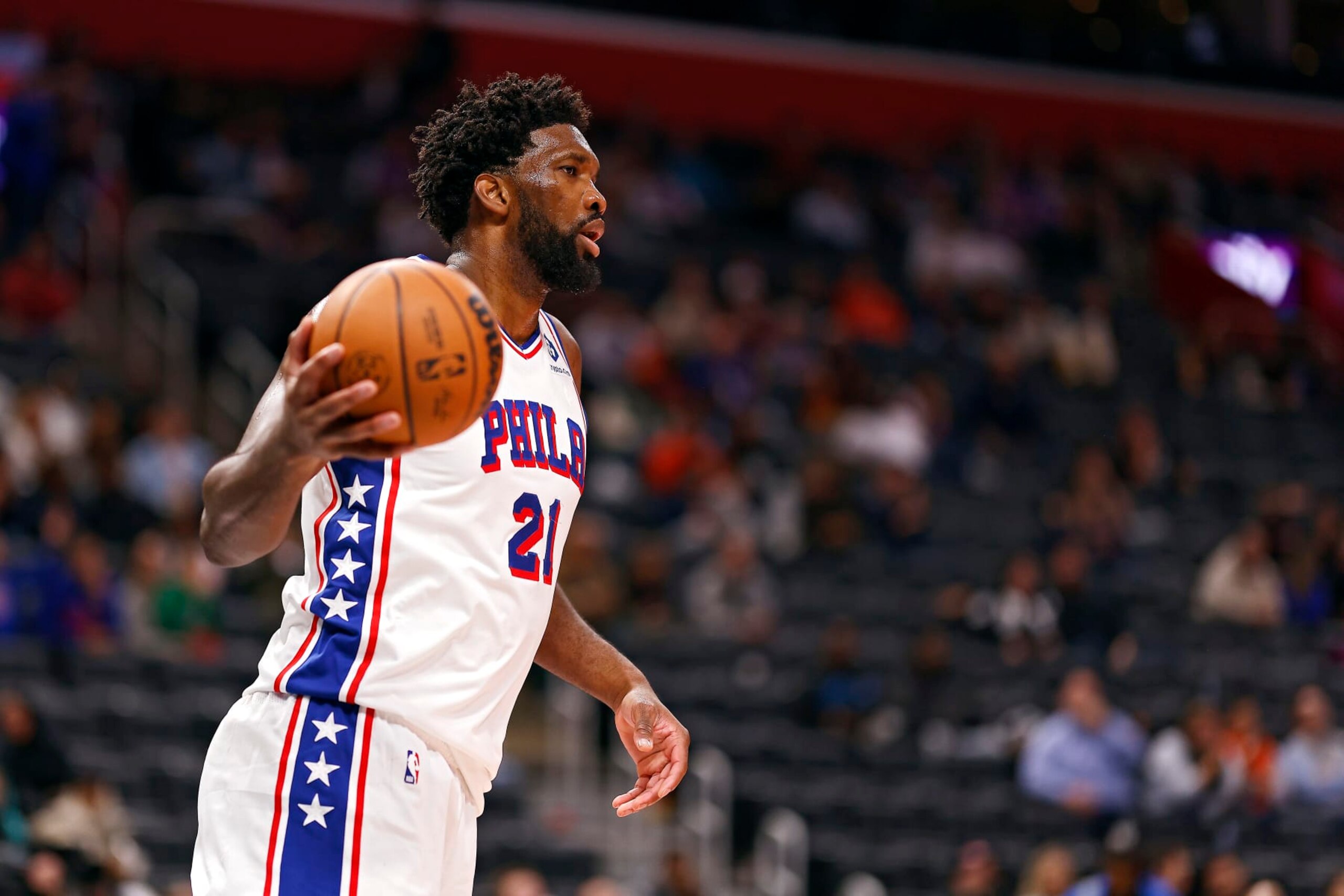 DETROIT, MICHIGAN - NOVEMBER 10: Joel Embiid #21 of the Philadelphia 76ers looks to pass the ball in the fourth quarter of a game against the Detroit Pistons at Little Caesars Arena on November 10, 2023 in Detroit, Michigan. NOTE TO USER: User expressly acknowledges and agrees that, by downloading and or using this photograph, User is consenting to the terms and conditions of the Getty Images License Agreement. (Photo by Mike Mulholland/Getty Images)
