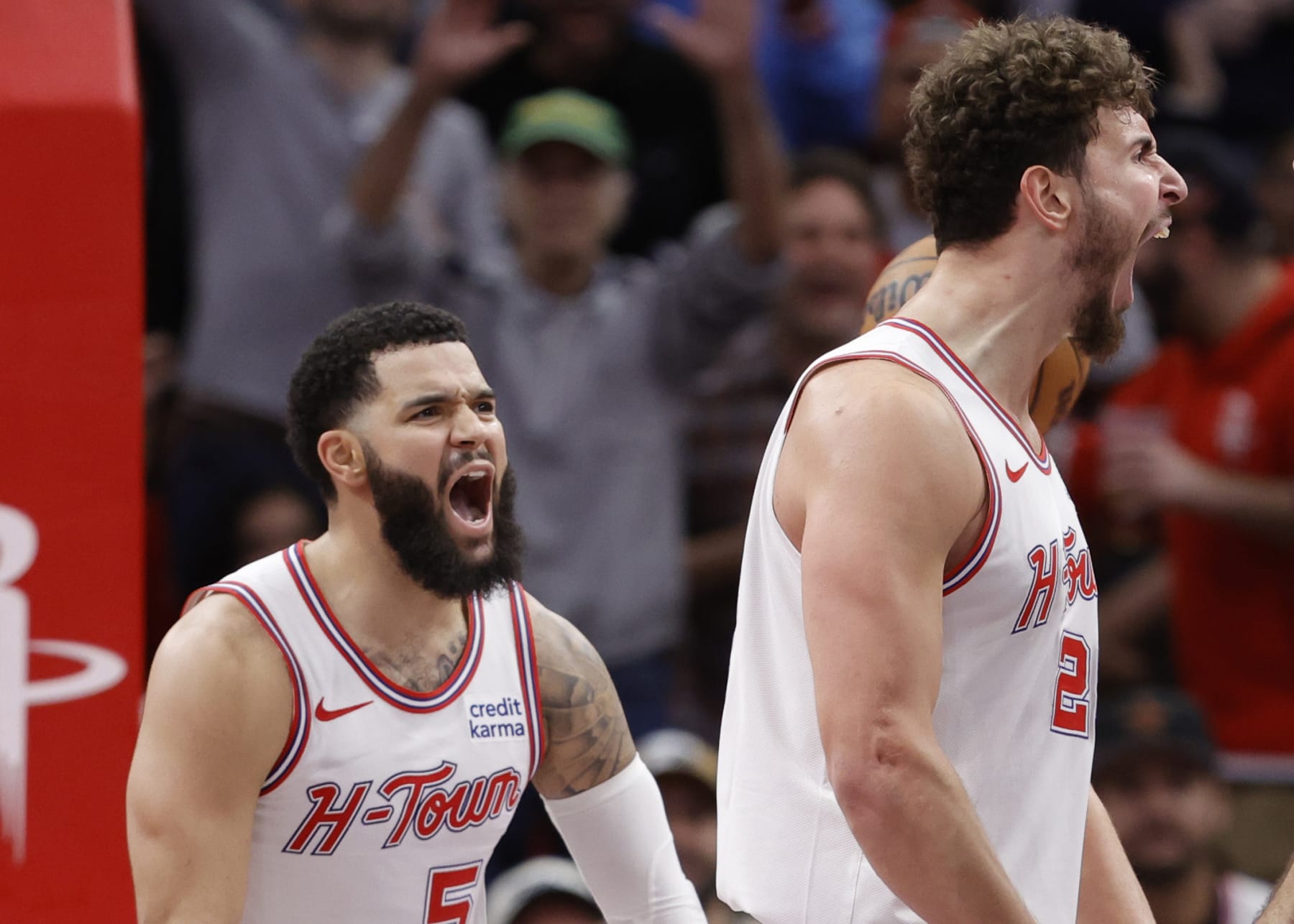 HOUSTON, TEXAS - NOVEMBER 10: Alperen Sengun #28 and Fred VanVleet #5 of the Houston Rockets react to a basket during the second half against the New Orleans Pelicans at Toyota Center on November 10, 2023 in Houston, Texas. NOTE TO USER: User expressly acknowledges and agrees that, by downloading and or using this photograph, User is consenting to the terms and conditions of the Getty Images License Agreement.  (Photo by Carmen Mandato/Getty Images)