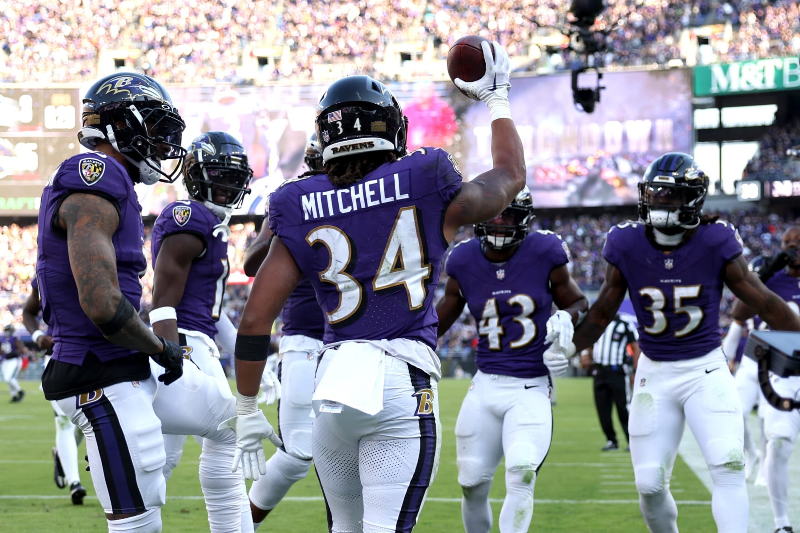 BALTIMORE, MARYLAND - NOVEMBER 05: Keaton Mitchell #34 of the Baltimore Ravens celebrates after a touchdown during the second half in the game against the Seattle Seahawks at M&T Bank Stadium on November 05, 2023 in Baltimore, Maryland. (Photo by Scott Taetsch/Getty Images)