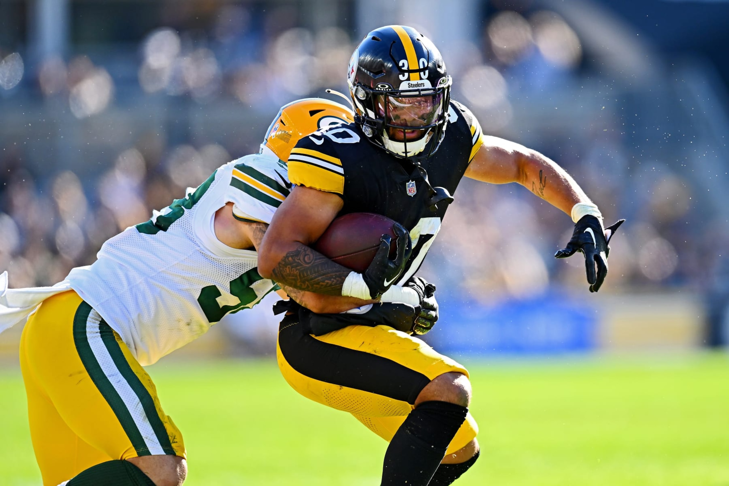 Steelers RB Jaylen Warren and Packers LB Isaiah McDuffie