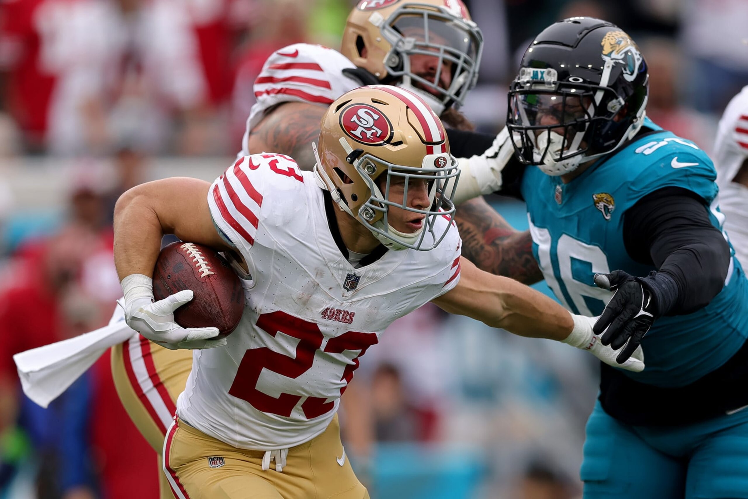 JACKSONVILLE, FLORIDA - NOVEMBER 12: Christian McCaffrey #23 of the San Francisco 49ers runs with the ball during the second quarter against the Jacksonville Jaguars at EverBank Stadium on November 12, 2023 in Jacksonville, Florida. (Photo by Megan Briggs/Getty Images)