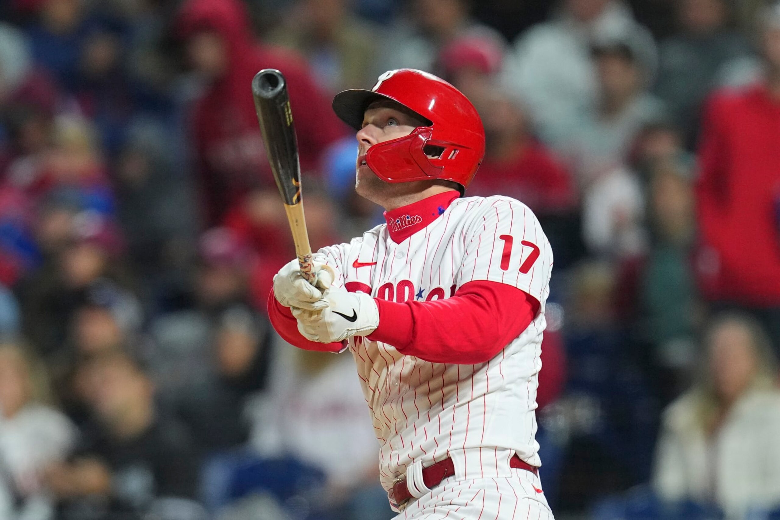 PHILADELPHIA, PA - SEPTEMBER 23: Rhys Hoskins #17 of the Philadelphia Phillies hits a two run home run in the bottom of the fourth inning against the Atlanta Braves at Citizens Bank Park on September 23, 2022 in Philadelphia, Pennsylvania. (Photo by Mitchell Leff/Getty Images)