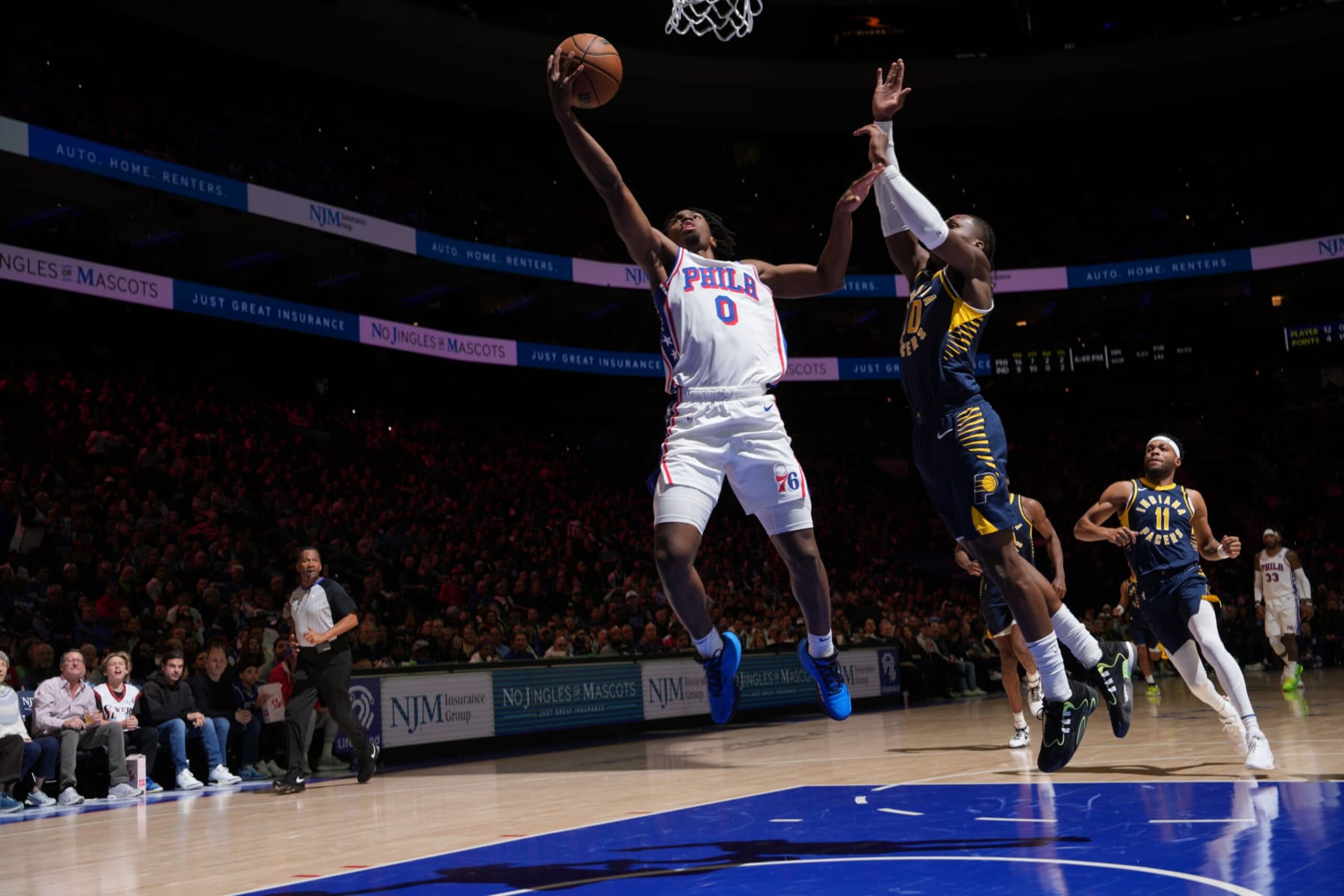 PHILADELPHIA, PA - NOVEMBER 12: Tyrese Maxey #0 of the Philadelphia 76ers drives to the basket during the game against the Indiana Pacers on November 12, 2023 at the Wells Fargo Center in Philadelphia, Pennsylvania NOTE TO USER: User expressly acknowledges and agrees that, by downloading and/or using this Photograph, user is consenting to the terms and conditions of the Getty Images License Agreement. Mandatory Copyright Notice: Copyright 2023 NBAE (Photo by Jesse D. Garrabrant/NBAE via Getty Images)