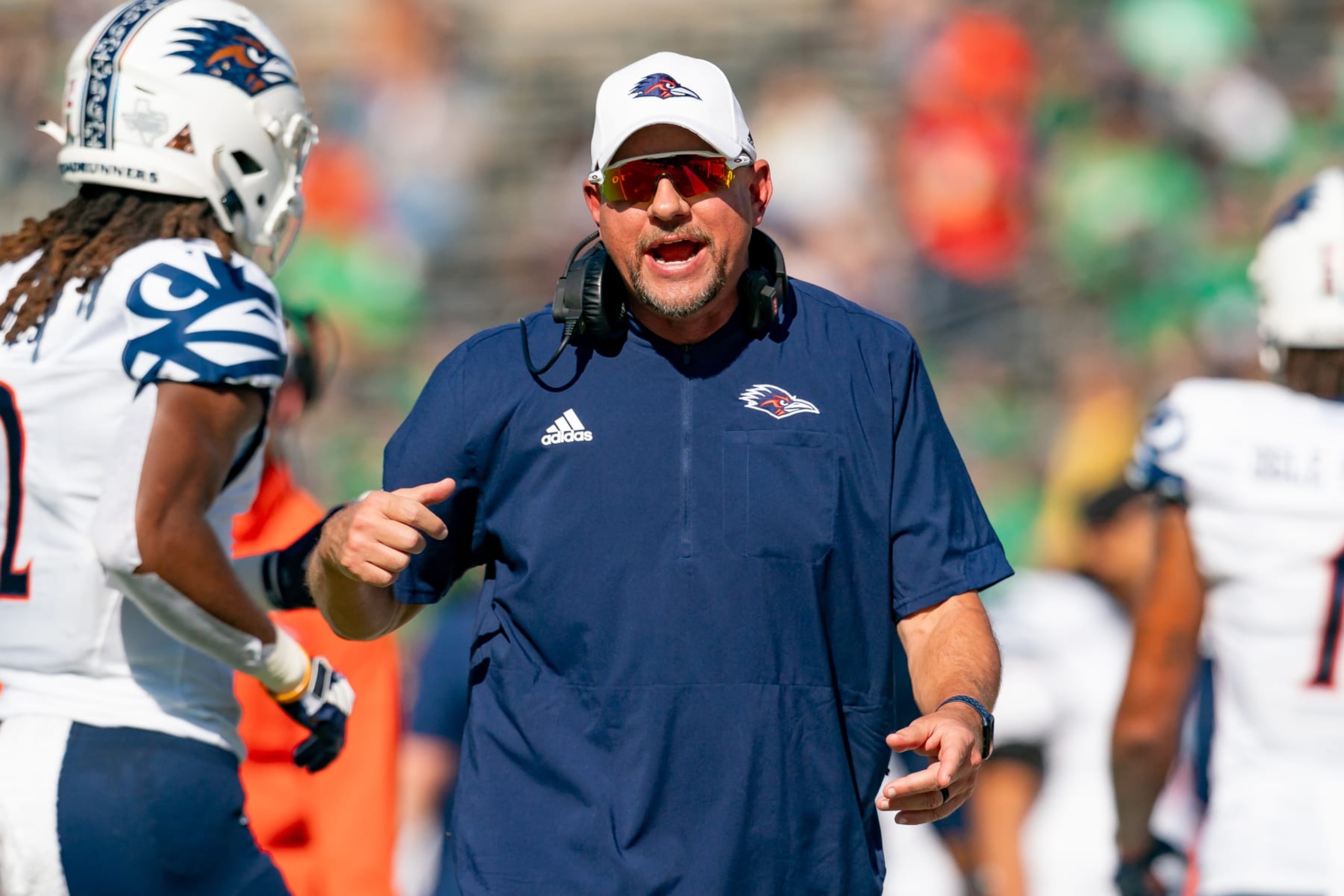 DENTON, TX - NOVEMBER 04:UTSA Roadrunners head coach Jeff Traylor talks with players during the UTSA Roadrunners  and North Texas Mean Green on November 4, 2023 at Apogee Stadium, TX. (Photo by Christopher Leduc/Icon Sportswire via Getty Images)