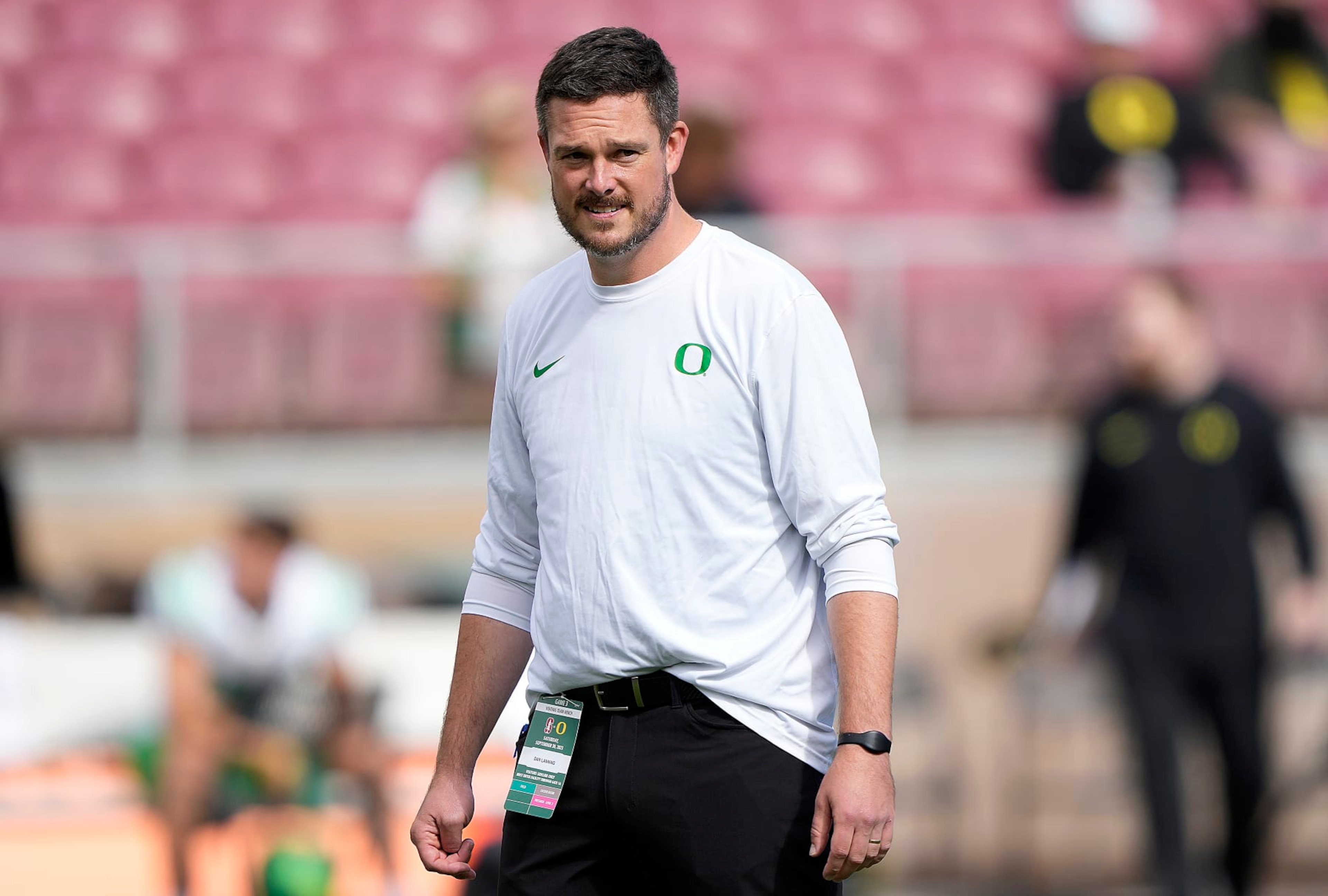 STANFORD, CALIFORNIA - SEPTEMBER 30: Head coach Dan Lanning of the Oregon Ducks looks on while his team warms up prior to playing against the Stanford Cardinal in an NCAA football game at Stanford Stadium on September 30, 2023 in Stanford, California. (Photo by Thearon W. Henderson/Getty Images) STANFORD, CALIFORNIA - SEPTEMBER 30: Head coach Dan Lanning of the Oregon Ducks looks on while his team warms up prior to playing against the Stanford Cardinal in an NCAA football game at Stanford Stadium on September 30, 2023 in Stanford, California. (Photo by Thearon W. Henderson/Getty Images)