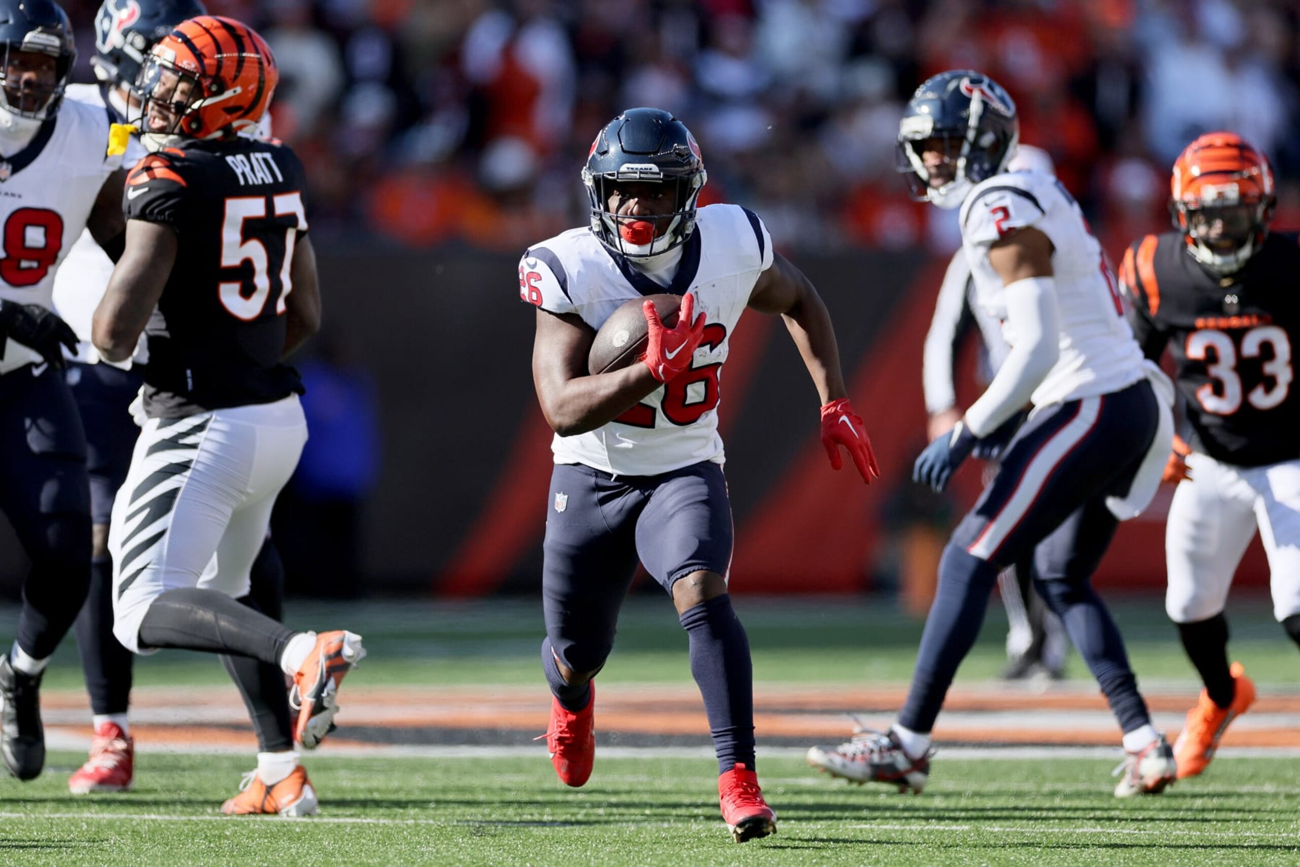 CINCINNATI, OHIO - NOVEMBER 12: Devin Singletary #26 of the Houston Texans runs with the ball against the Cincinnati Bengals during the second quarter at Paycor Stadium on November 12, 2023 in Cincinnati, Ohio. (Photo by Andy Lyons/Getty Images)