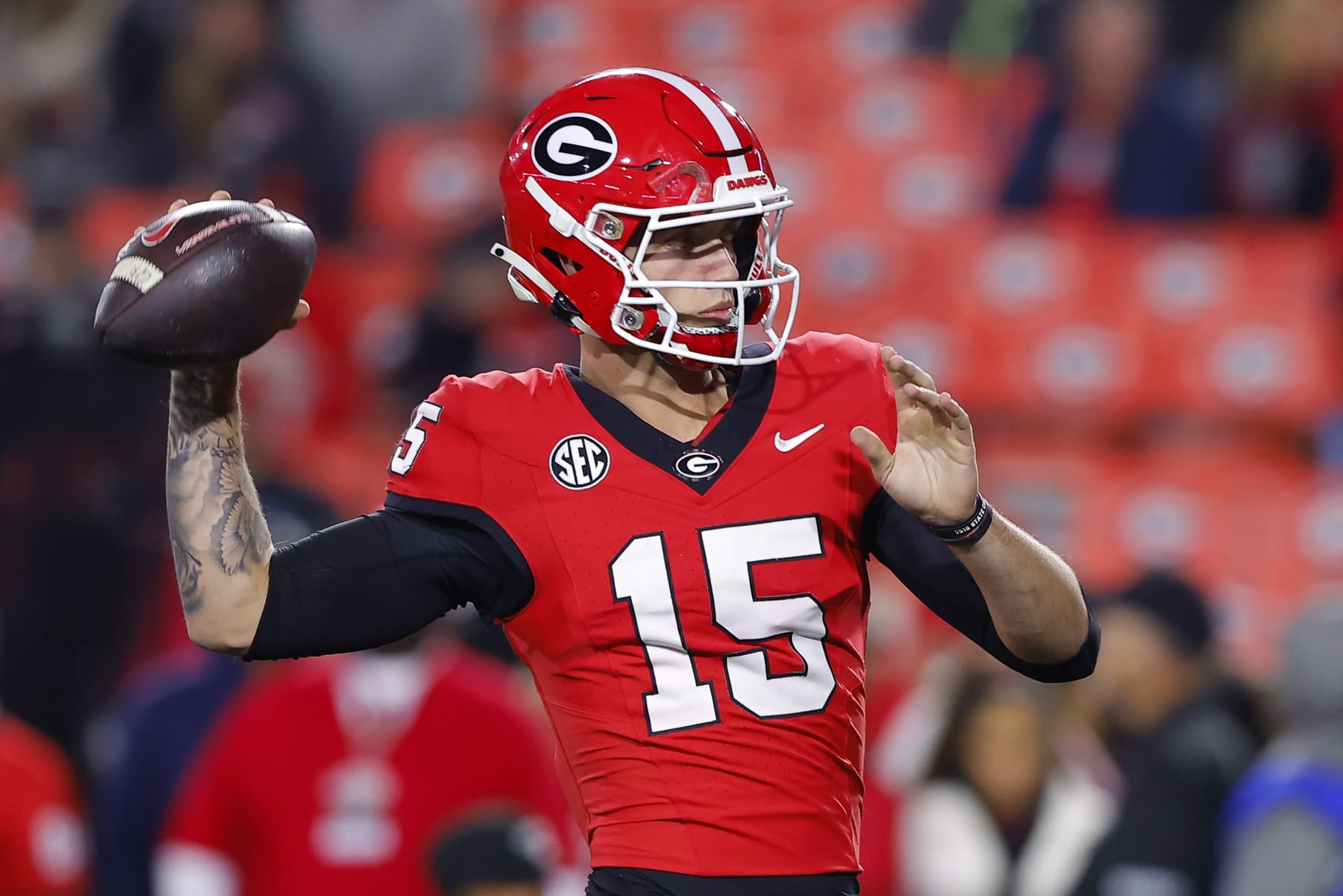 ATHENS, GEORGIA - NOVEMBER 11: Carson Beck #15 of the Georgia Bulldogs warms up prior to the game against the Mississippi Rebels at Sanford Stadium on November 11, 2023 in Athens, Georgia. (Photo by Todd Kirkland/Getty Images)
