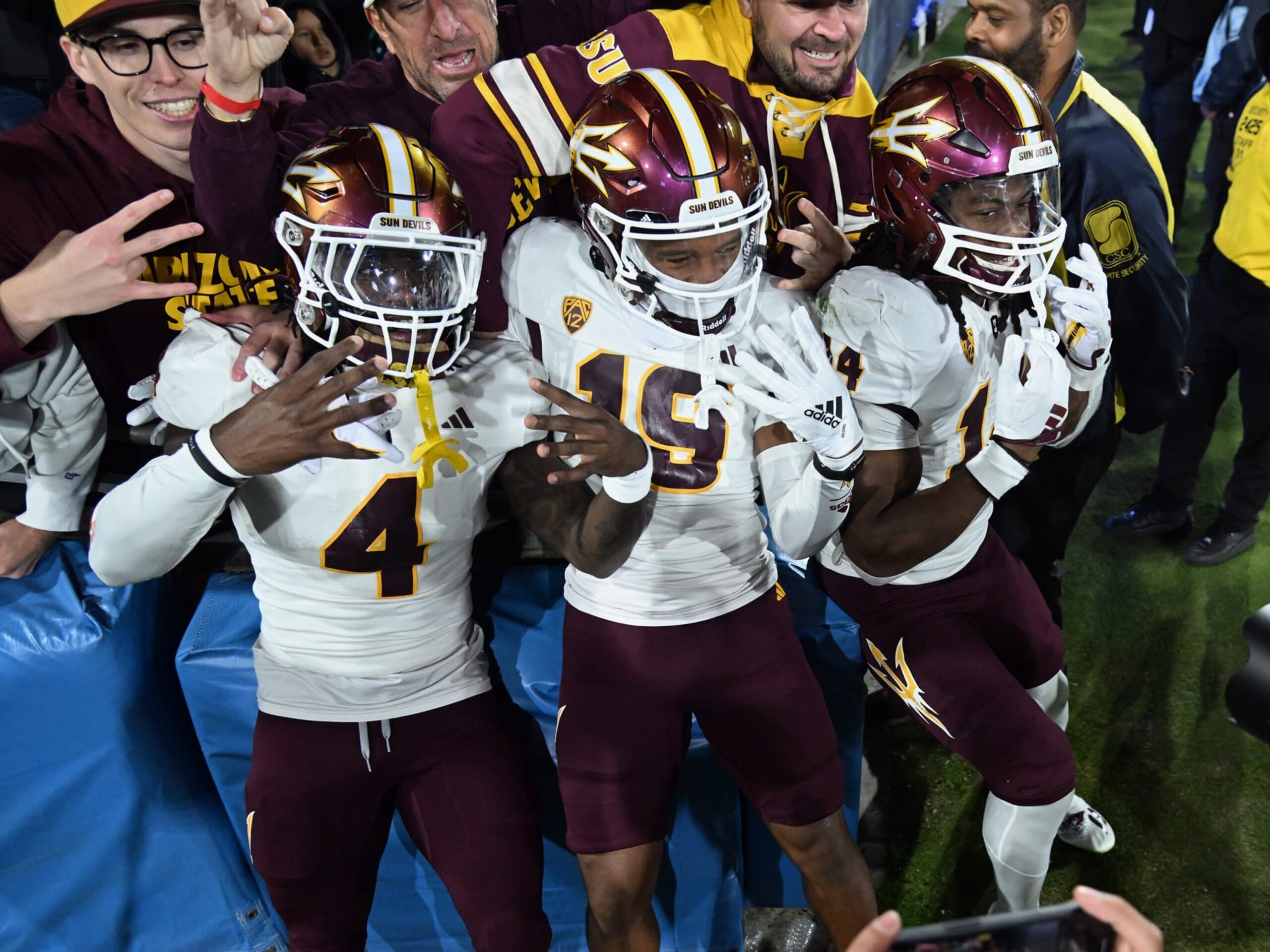 PASADENA, CA - NOVEMBER 11: Arizona State Sun Devils players celebrate with the fans after the Sun Devils defeated the UCLA Bruins 17 to 7 in an NCAA football game played on November 11, 2023 at the Rose Bowl Stadium in Pasadena, CA. (Photo by John Cordes/Icon Sportswire via Getty Images)