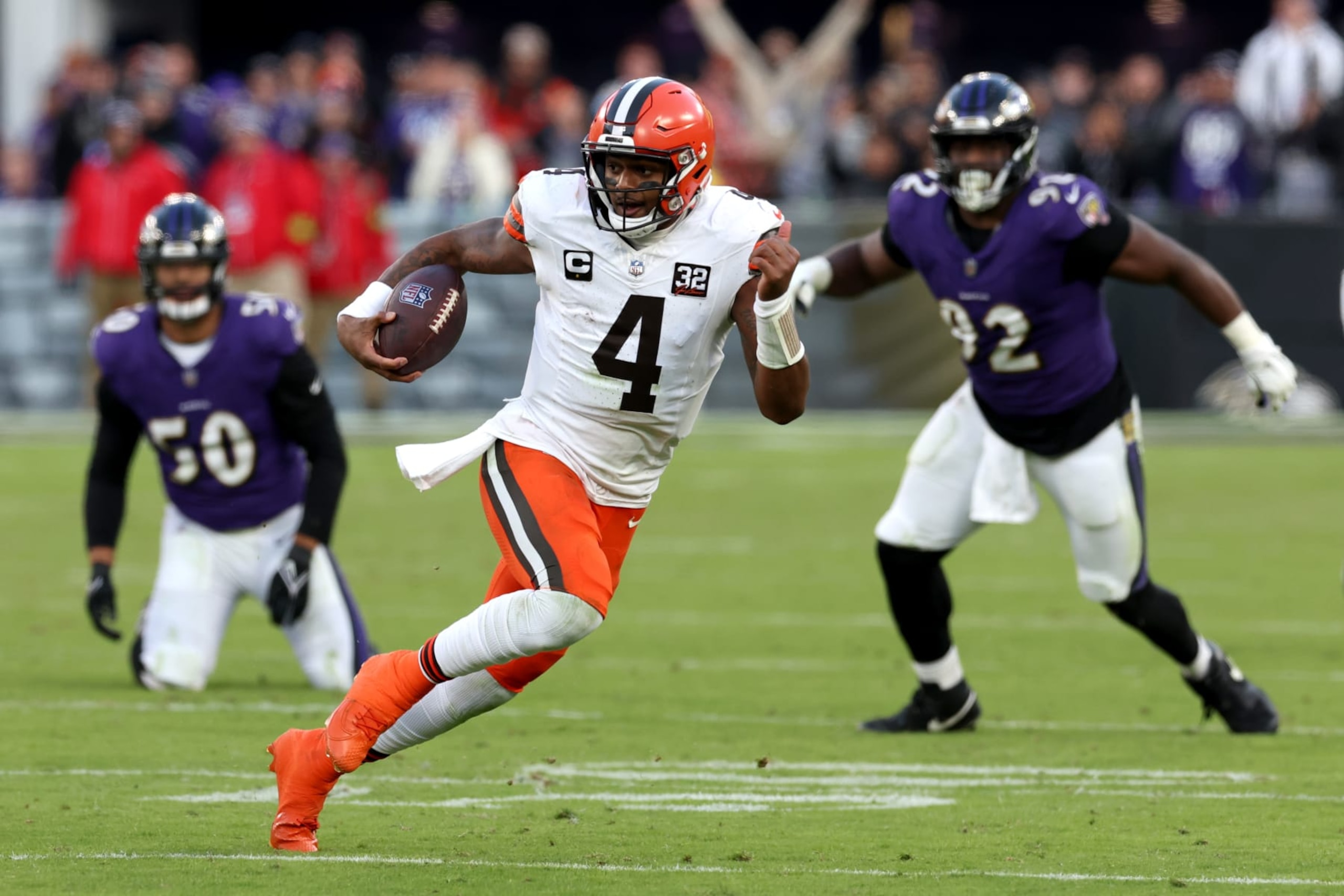 BALTIMORE, MARYLAND - NOVEMBER 12: Deshaun Watson #4 of the Cleveland Browns runs the ball against the Baltimore Ravens during the fourth quarter at M&T Bank Stadium on November 12, 2023 in Baltimore, Maryland. (Photo by Todd Olszewski/Getty Images)