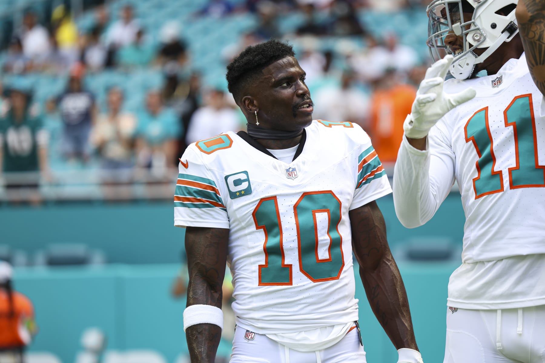 MIAMI GARDENS, FL - OCTOBER 29: Tyreek Hill #10 of the Miami Dolphins warms up prior to an NFL football game against the New England Patriots at Hard Rock Stadium on October 29, 2023 in Miami Gardens, Florida. (Photo by Perry Knotts/Getty Images)