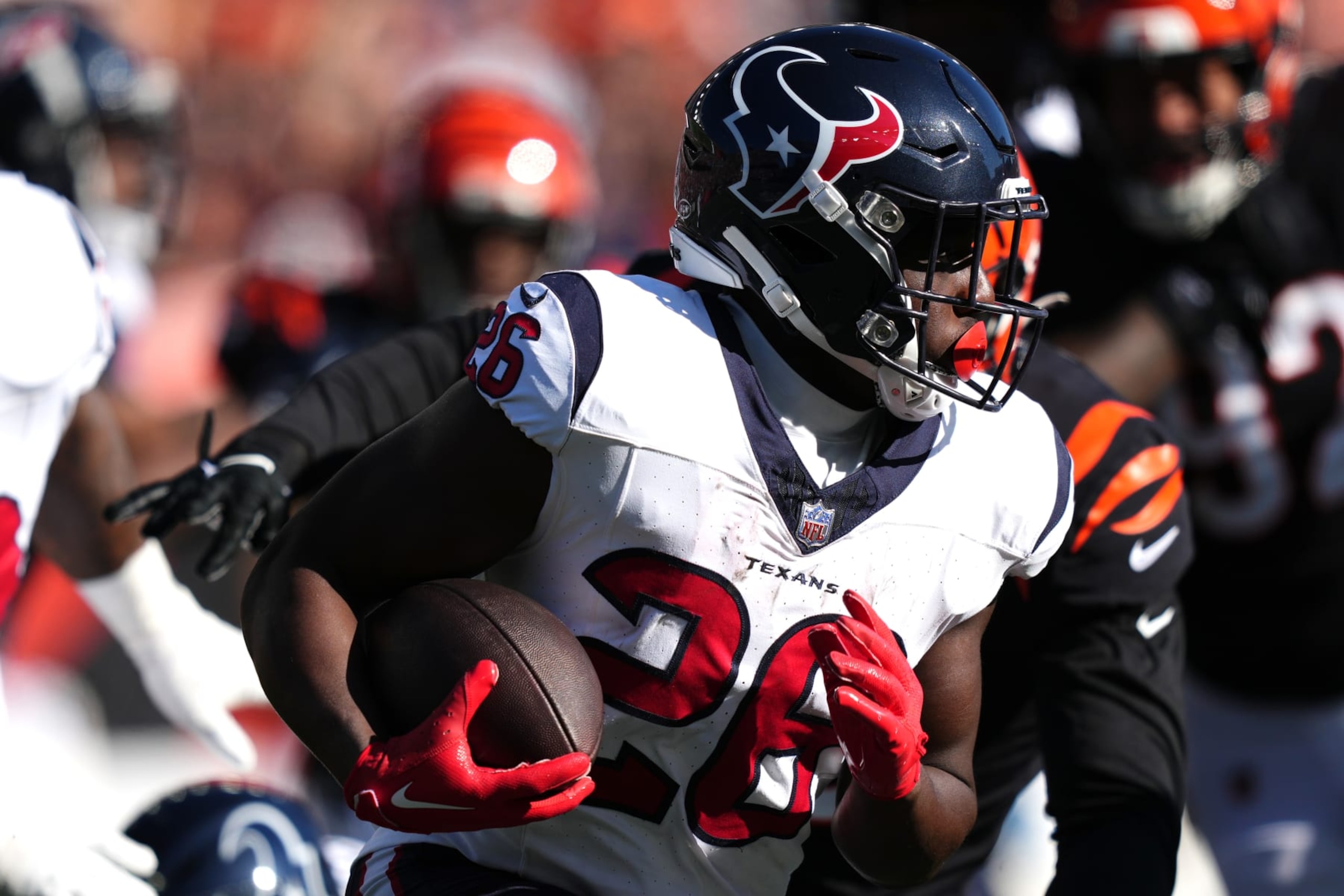 CINCINNATI, OHIO - NOVEMBER 12: Devin Singletary #26 of the Houston Texans runs with the ball during the first quarter against the Cincinnati Bengals at Paycor Stadium on November 12, 2023 in Cincinnati, Ohio. (Photo by Dylan Buell/Getty Images)