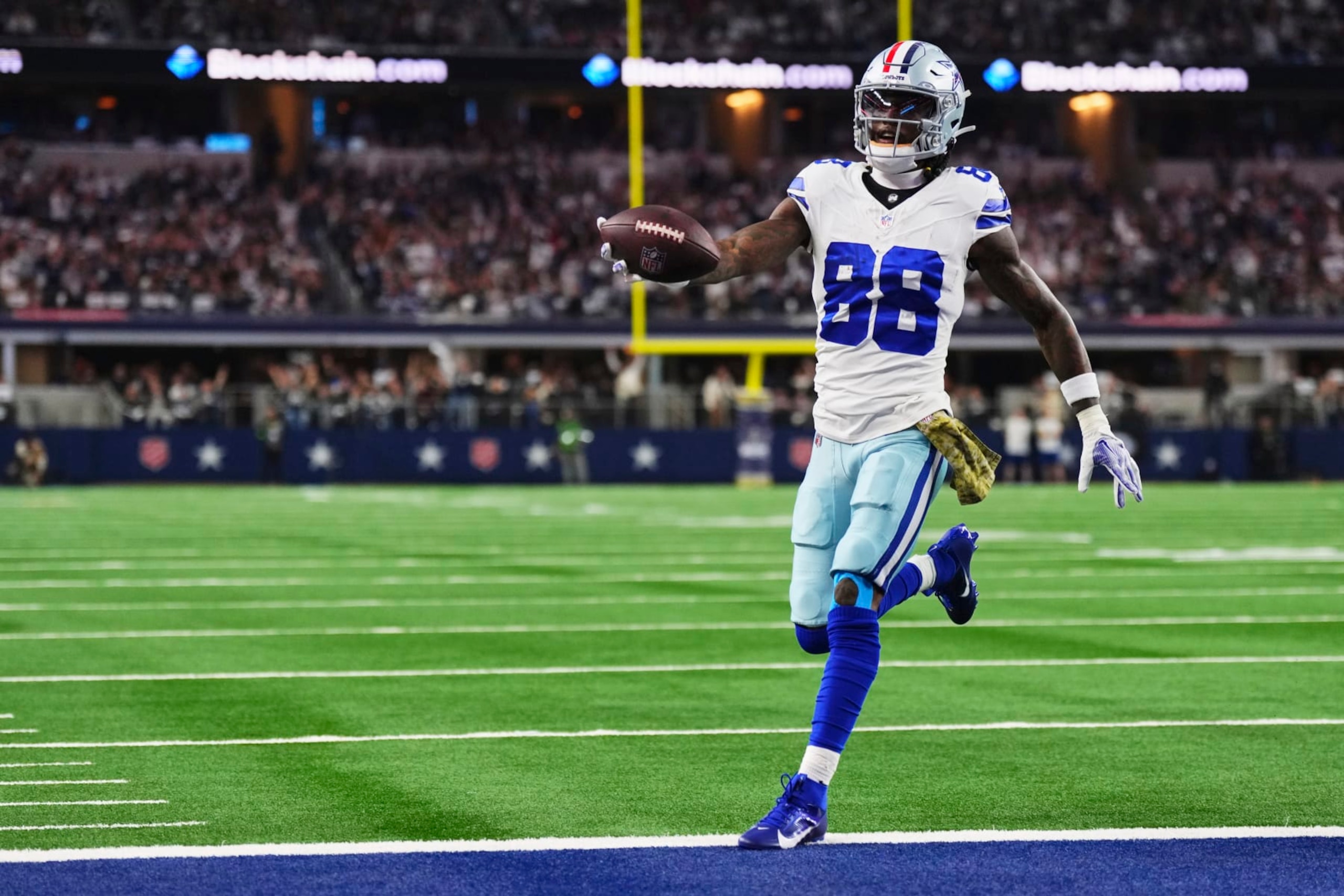 ARLINGTON, TX - NOVEMBER 12: CeeDee Lamb #88 of the Dallas Cowboys scores a touchdown against the New York Giants during the first half at AT&T Stadium on November 12, 2023 in Arlington, Texas. (Photo by Cooper Neill/Getty Images)